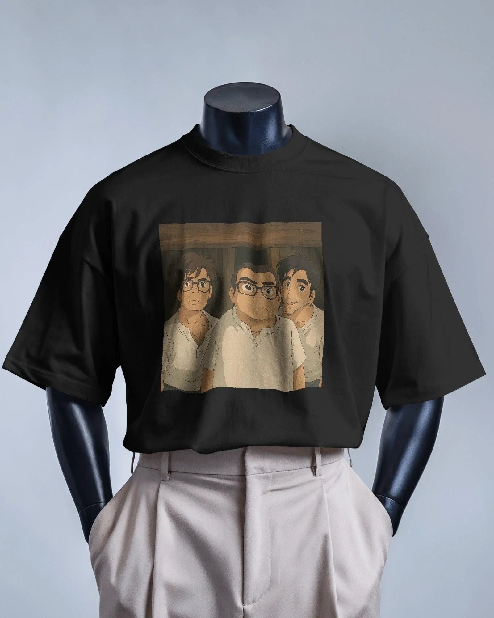 Black oversized t-shirt featuring a unique fusion of Ghibli art and Hera Pheri's iconic Babu Rao. The design blends anime-style illustration with the beloved Bollywood character, printed on premium cotton for a soft and durable finish.