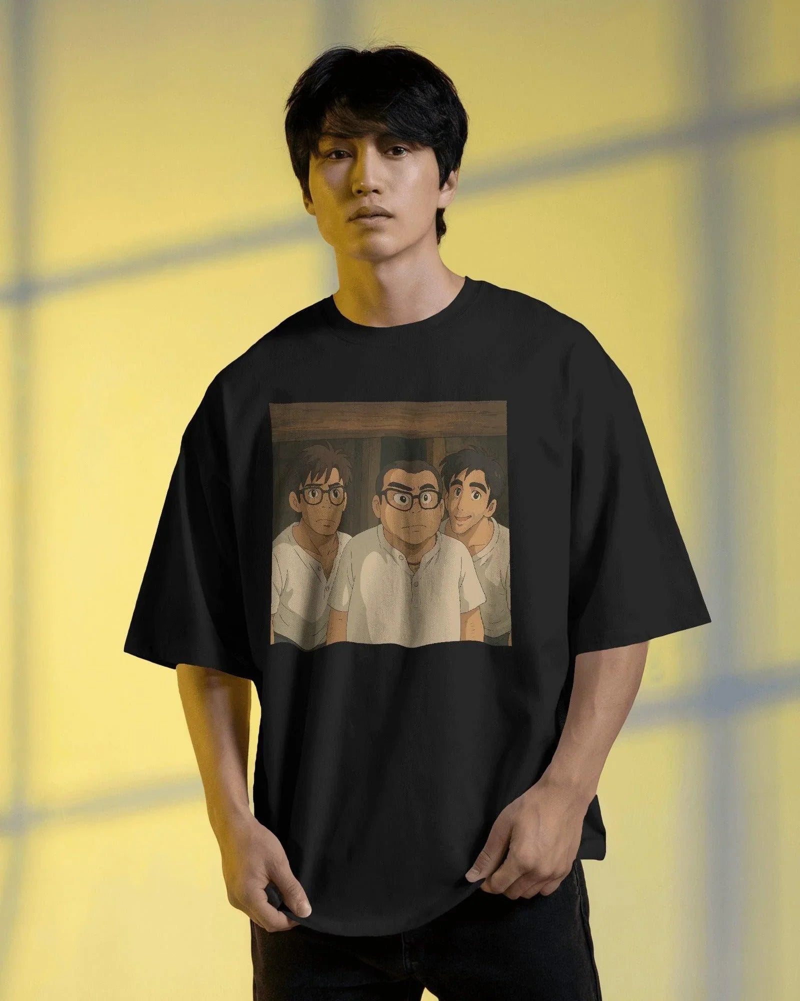 Black oversized t-shirt featuring a unique fusion of Ghibli art and Hera Pheri's iconic Babu Rao. The design blends anime-style illustration with the beloved Bollywood character, printed on premium cotton for a soft and durable finish.