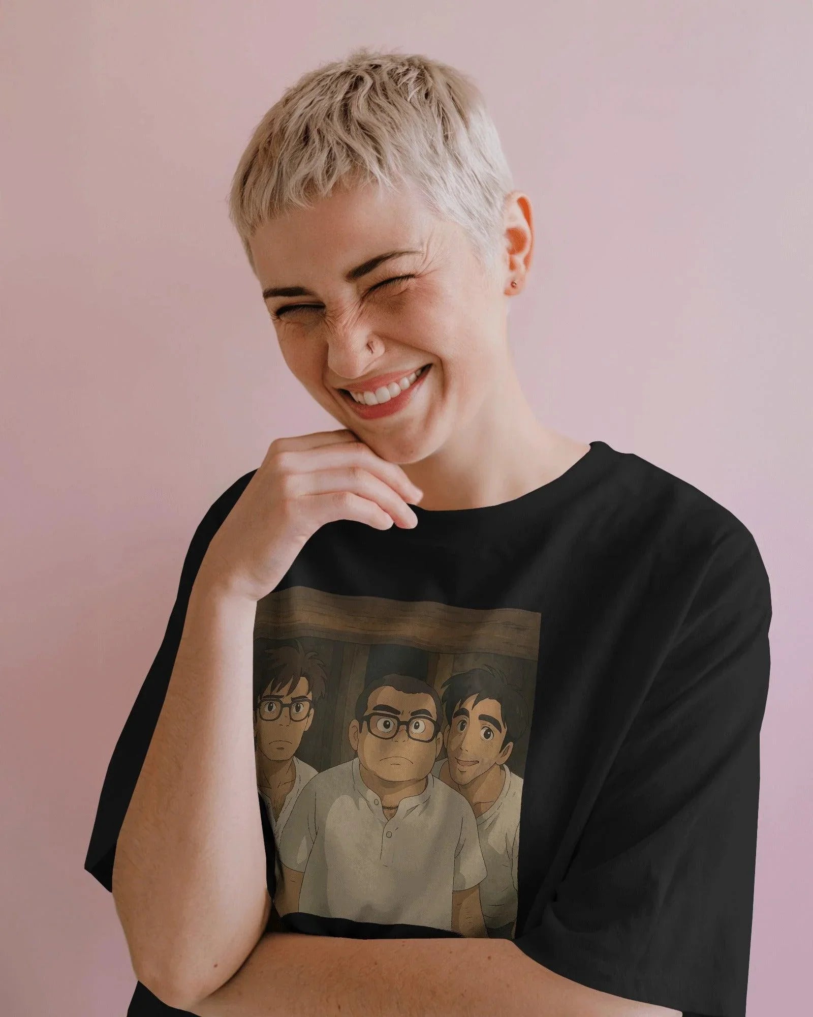 Black oversized t-shirt featuring a unique fusion of Ghibli art and Hera Pheri's iconic Babu Rao. The design blends anime-style illustration with the beloved Bollywood character, printed on premium cotton for a soft and durable finish.
