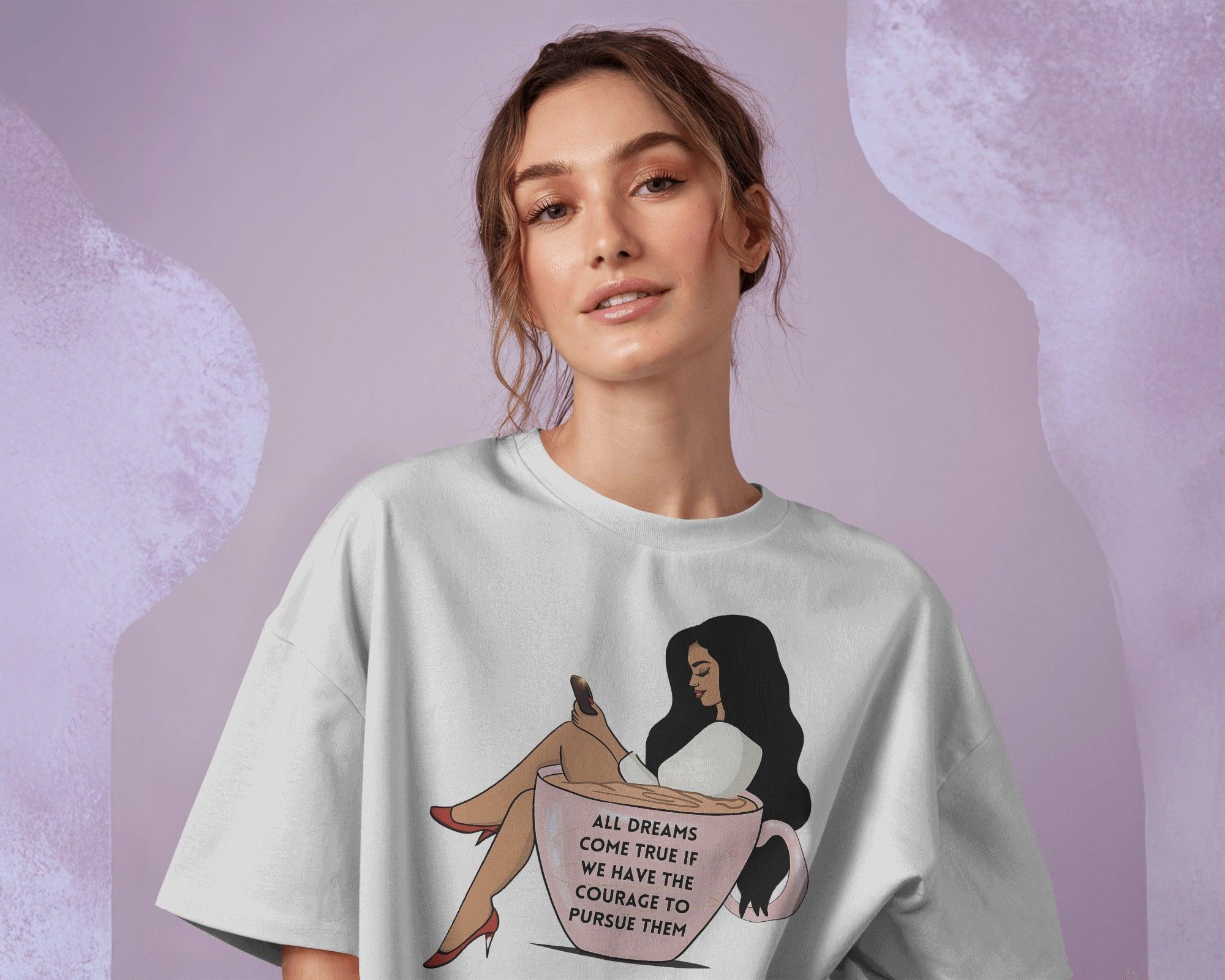 White women's t-shirt from Nitorious Atelier featuring the inspirational quote 'All Dreams Come True If We Have the Courage to Pursue Them' in a stylish print. Made from premium cotton for a soft, comfortable, and durable fit.