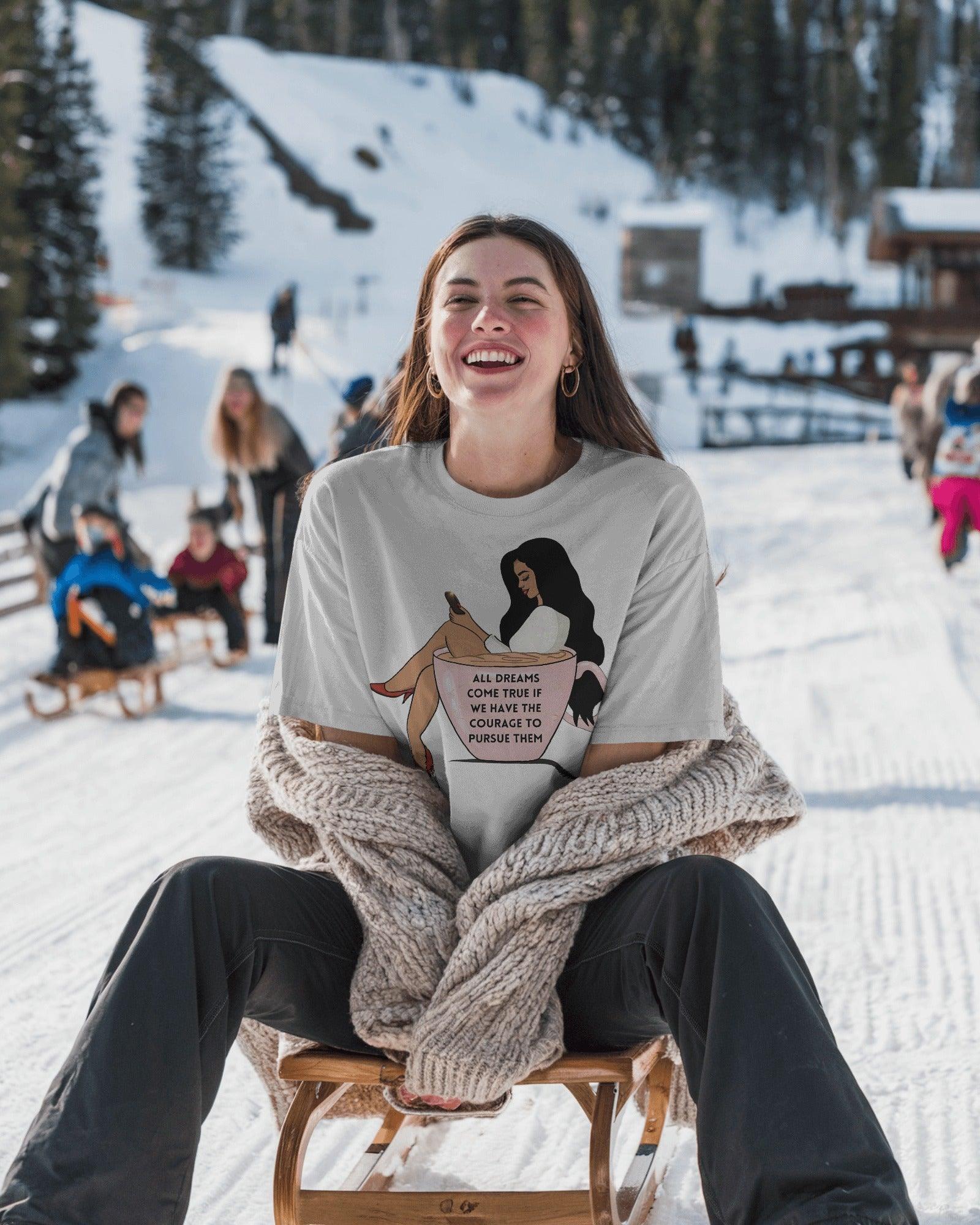 White women's t-shirt from Nitorious Atelier featuring the inspirational quote 'All Dreams Come True If We Have the Courage to Pursue Them' in a stylish print. Made from premium cotton for a soft, comfortable, and durable fit.