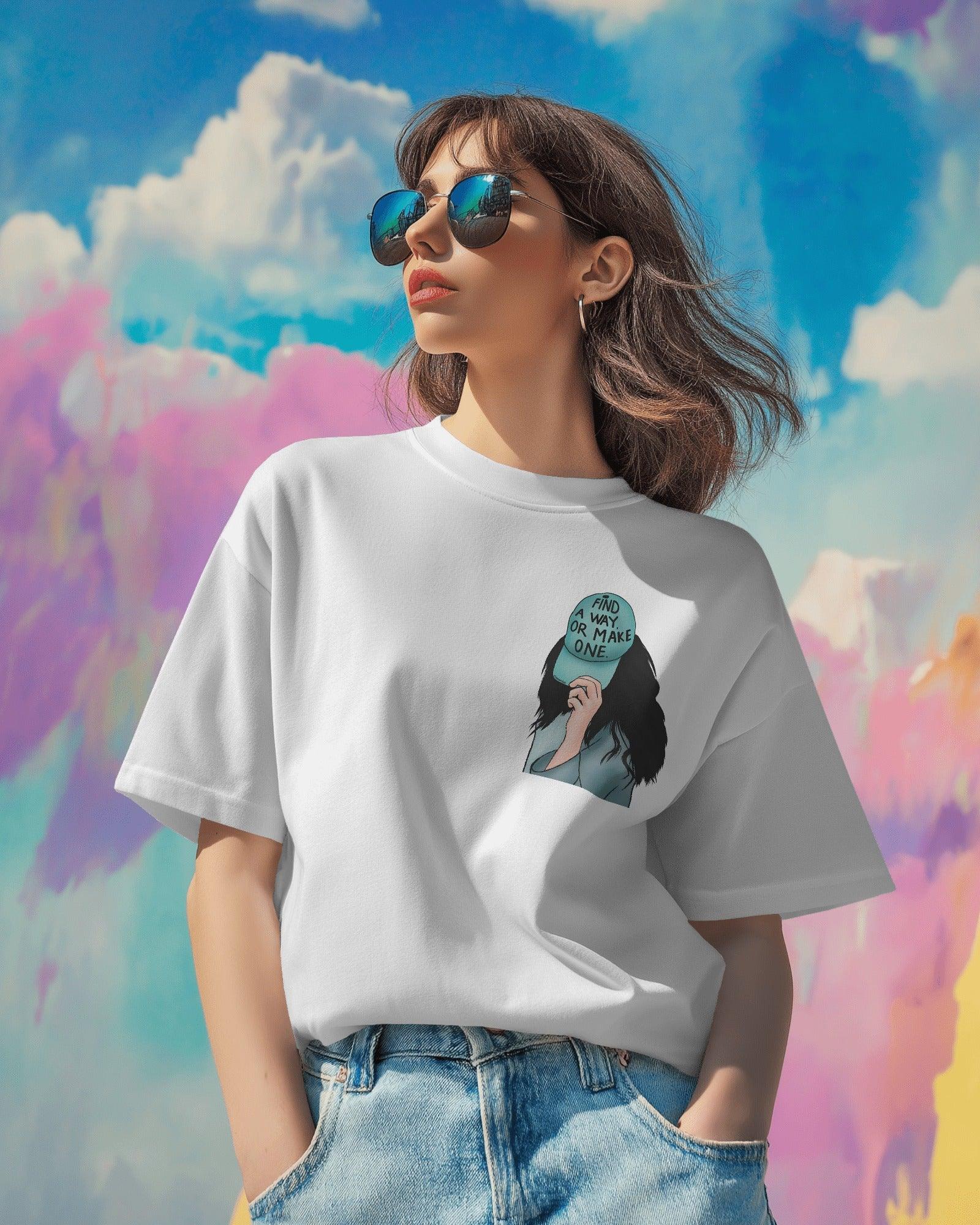 White women's t-shirt from Nitorious Atelier featuring the bold quote 'Find a Way or Make It' in a stylish font. Made from premium cotton for a soft and comfortable fit.