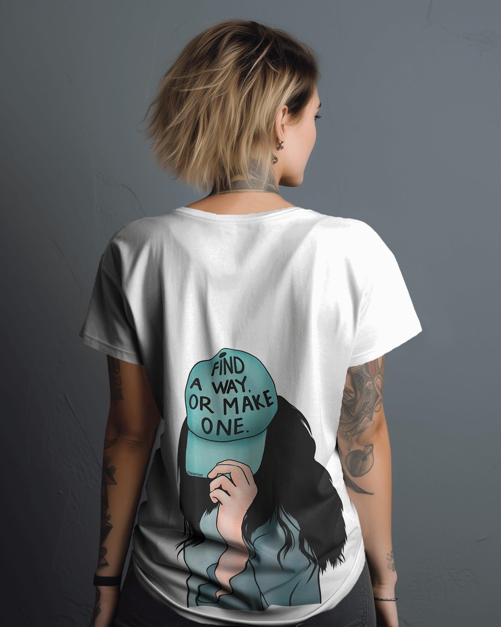 White women's t-shirt from Nitorious Atelier featuring the bold quote 'Find a Way or Make It' in a stylish font. Made from premium cotton for a soft and comfortable fit.