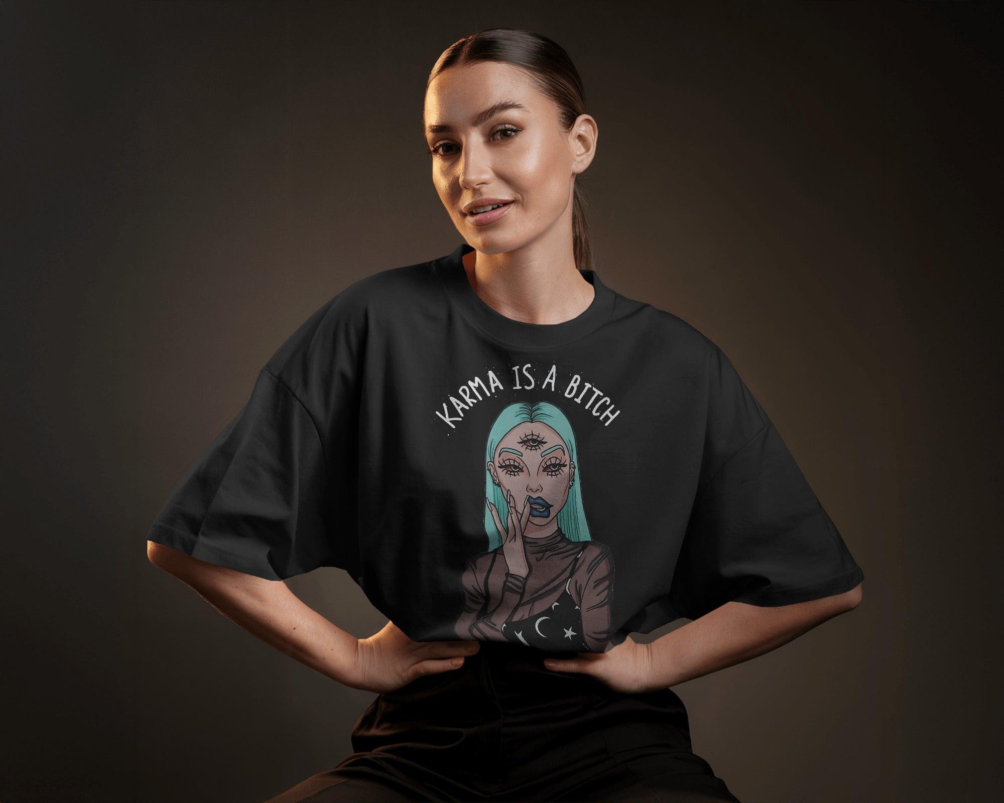 Oversized black t-shirt for women featuring the bold statement "Karma is a Bitch" in a striking font. Made from premium cotton, this t-shirt offers a relaxed fit for ultimate comfort. Its edgy design makes a powerful style statement, perfect for casual and streetwear looks.