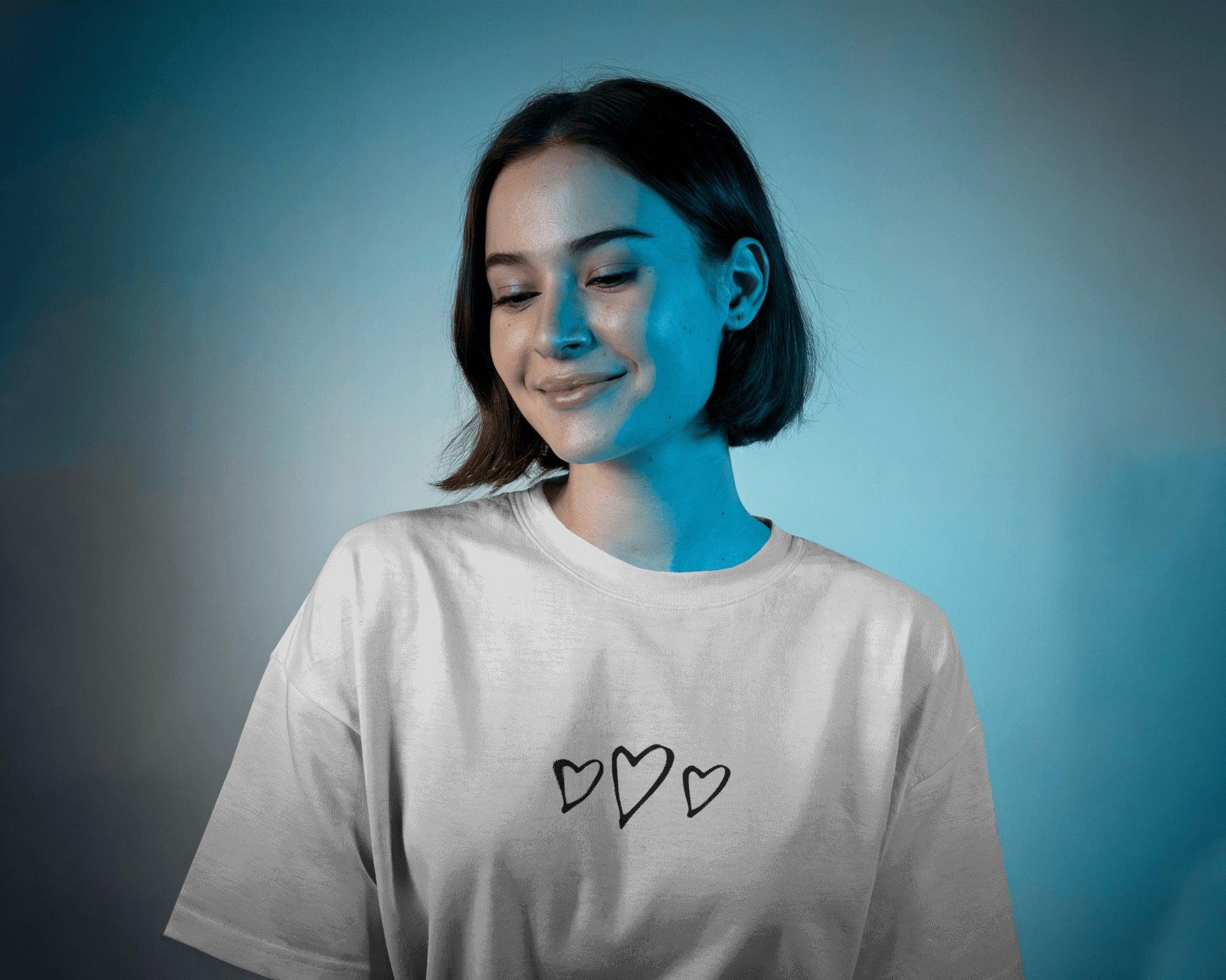 Oversized white t-shirt for women featuring the bold text "Moody But Make It Funky" in a stylish, playful font. Made from premium cotton, this t-shirt offers a relaxed fit for all-day comfort. Perfect for casual wear, the design adds a fun and expressive touch to any outfit.