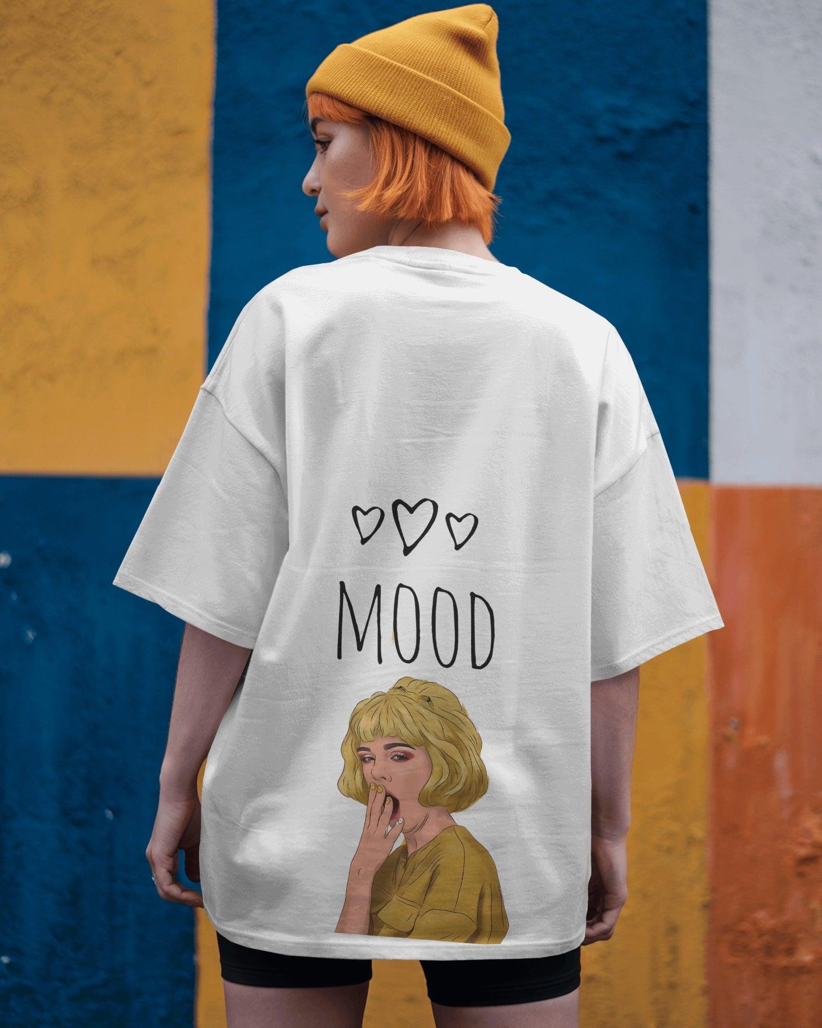 Oversized white t-shirt for women featuring the bold text "Moody But Make It Funky" in a stylish, playful font. Made from premium cotton, this t-shirt offers a relaxed fit for all-day comfort. Perfect for casual wear, the design adds a fun and expressive touch to any outfit.