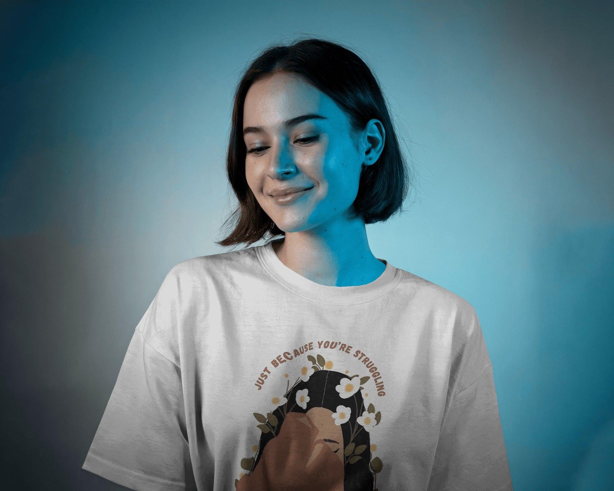 White oversized Tiara t-shirt for women from Nitorious Atelier. Made from premium cotton, this stylish and comfortable t-shirt features a minimal yet elegant tiara design, perfect for a casual yet chic look. Breathable fabric ensures all-day comfort, making it a must-have wardrobe essential.