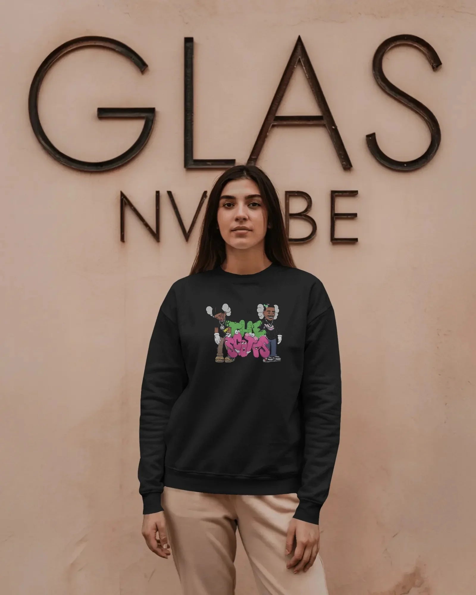 Black Travis Scott sweatshirt featuring bold graphic elements inspired by the rapper’s signature style. Made from premium cotton blend for comfort and streetwear appeal. Ideal for fans of hip-hop fashion and statement looks.