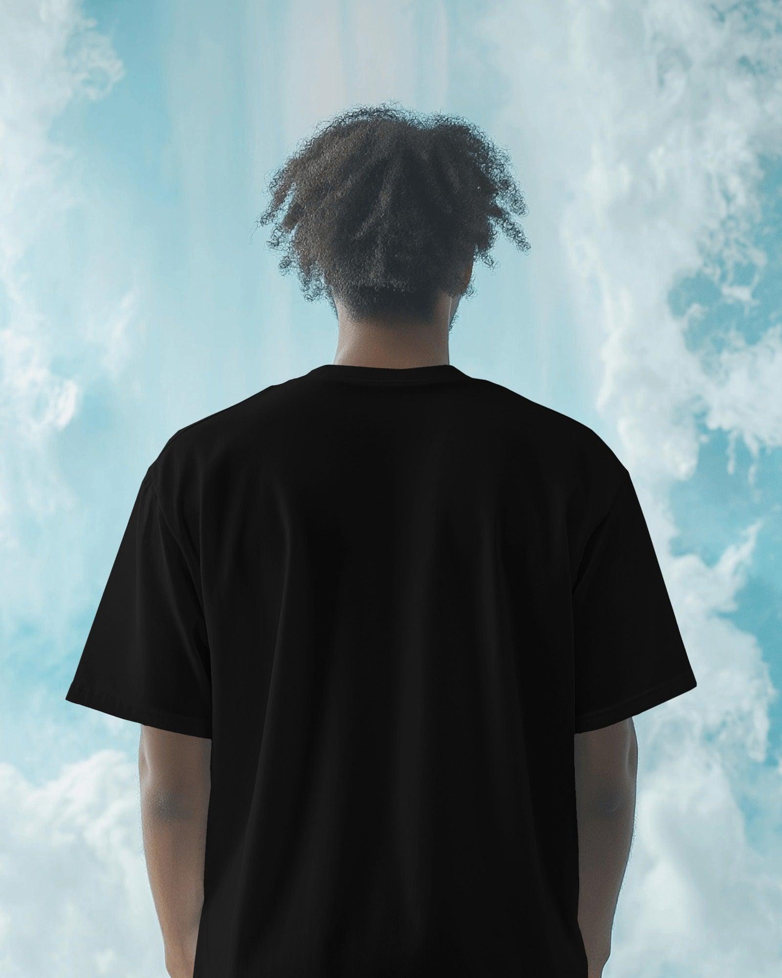 "Black oversized Travis Scott concert t-shirt from Nitorious Atelier, made with premium 220 GSM cotton. Features bold graphic print and a streetwear-inspired fit for a stylish, statement look