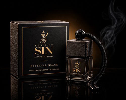 Silent Sin Betrayal Black automotive elixir perfume bottle with a black skull cap and black cord, displayed next to its textured black and gold packaging box on a reflective black surface.