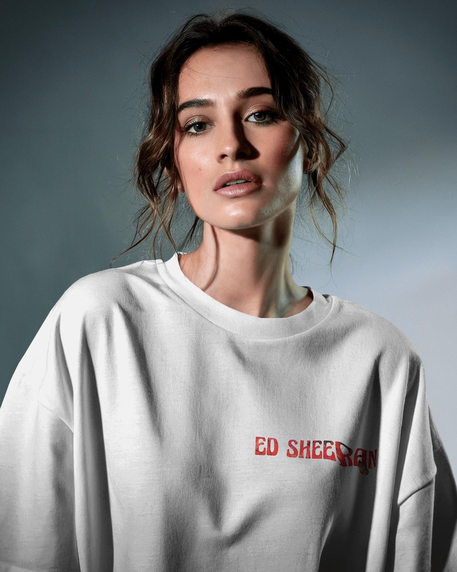 White oversized Ed Sheeran t-shirt from Nitorious Atelier featuring a striking red butterfly graphic alongside the iconic singer-songwriter. Crafted from premium cotton, this t-shirt offers a soft, breathable, and relaxed fit for all-day comfort and style.