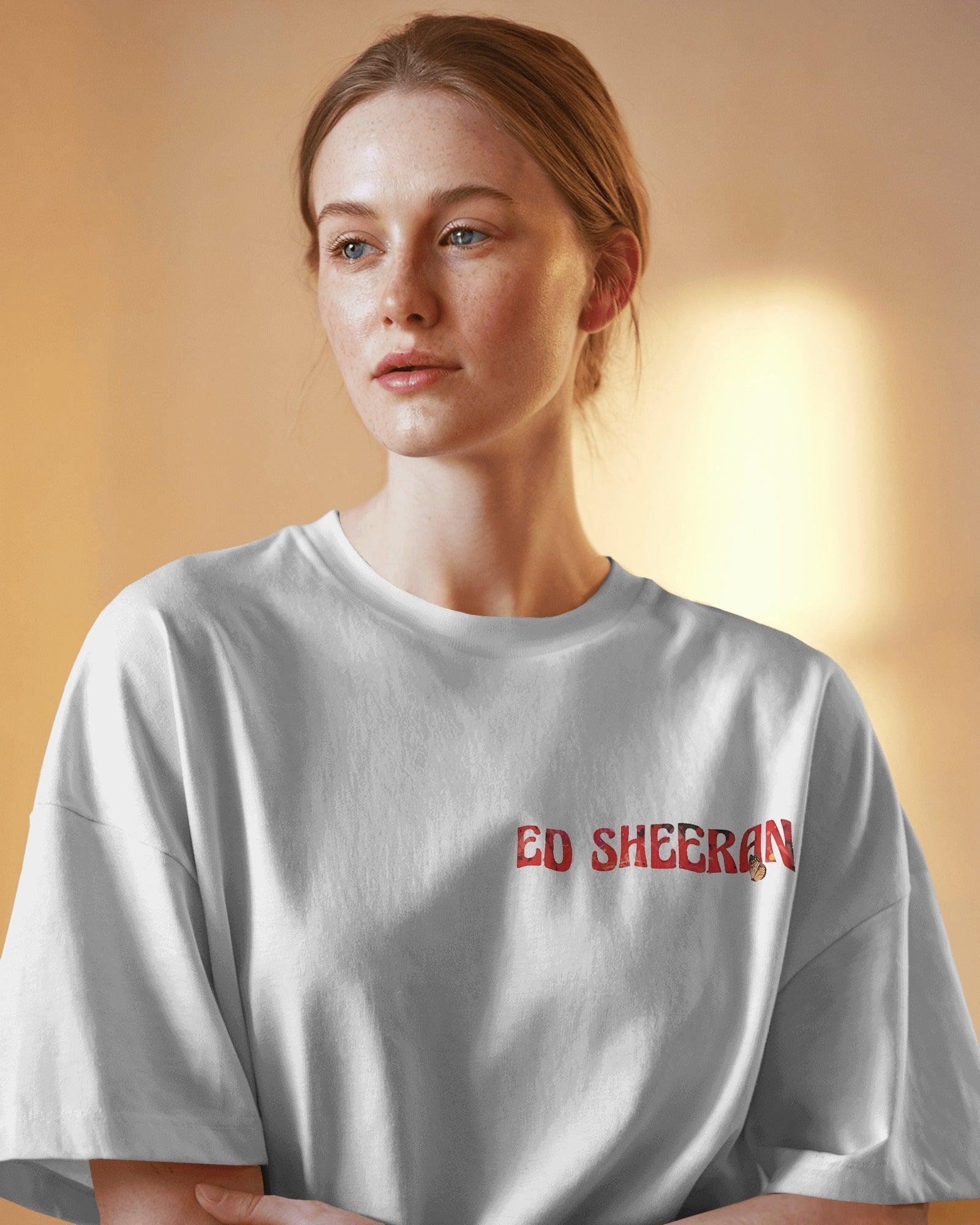 White oversized Ed Sheeran t-shirt from Nitorious Atelier featuring a striking red butterfly graphic alongside the iconic singer-songwriter. Crafted from premium cotton, this t-shirt offers a soft, breathable, and relaxed fit for all-day comfort and style.