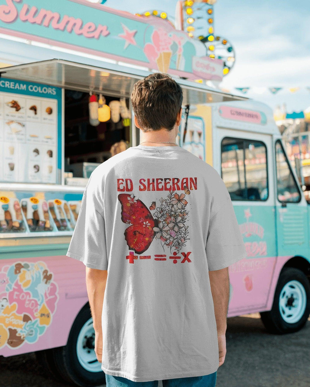 White oversized Ed Sheeran t-shirt from Nitorious Atelier featuring a striking red butterfly graphic alongside the iconic singer-songwriter. Crafted from premium cotton, this t-shirt offers a soft, breathable, and relaxed fit for all-day comfort and style.