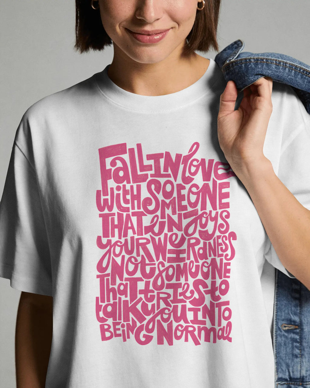 Fred Again India concert oversized white t-shirt with bold pink statement print on front