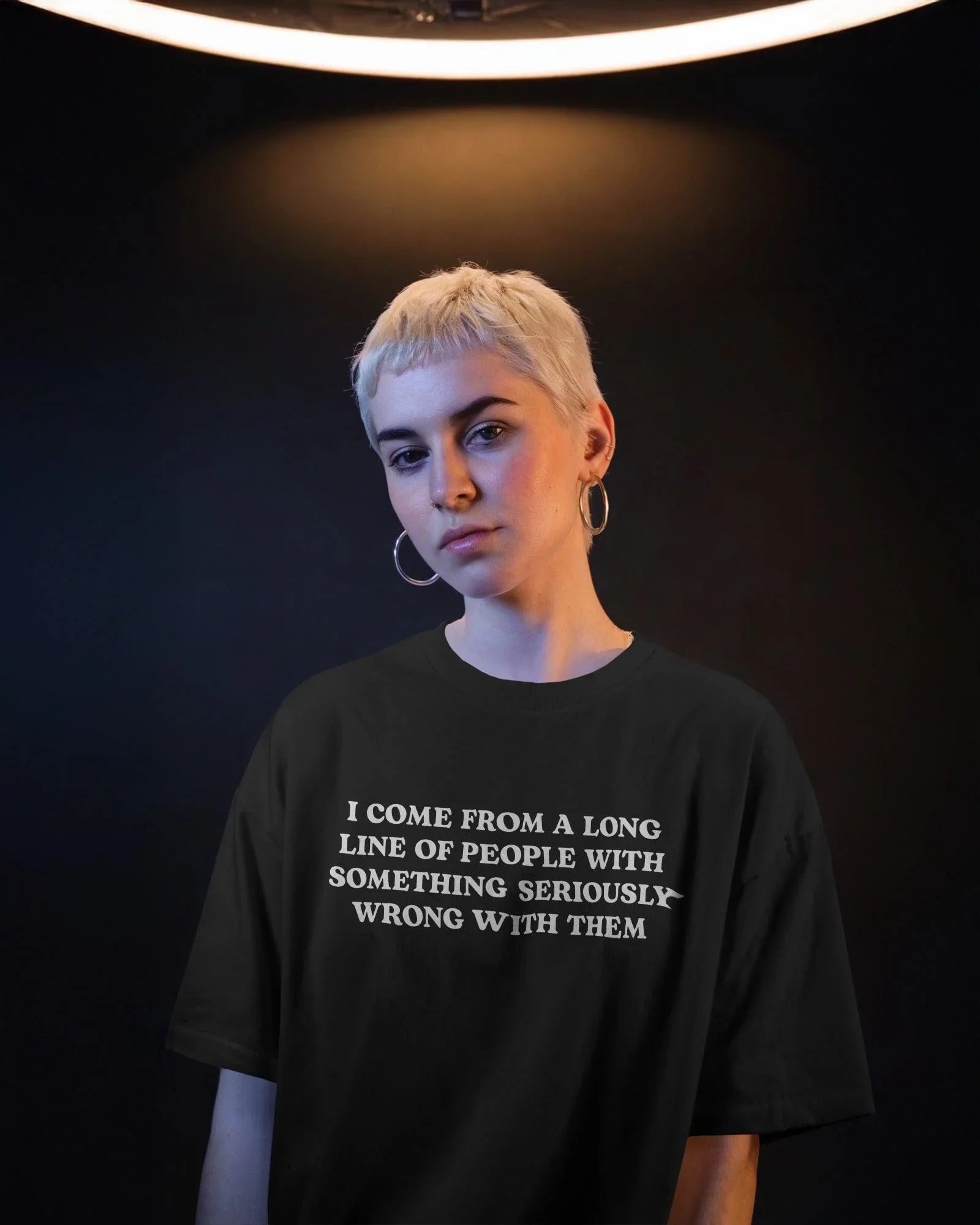 Oversized t-shirt featuring the bold statement ‘Generational Chaos.’ A witty take on family dysfunction, printed in a striking font for a perfect streetwear vibe. Made from premium cotton for ultimate comfort and style