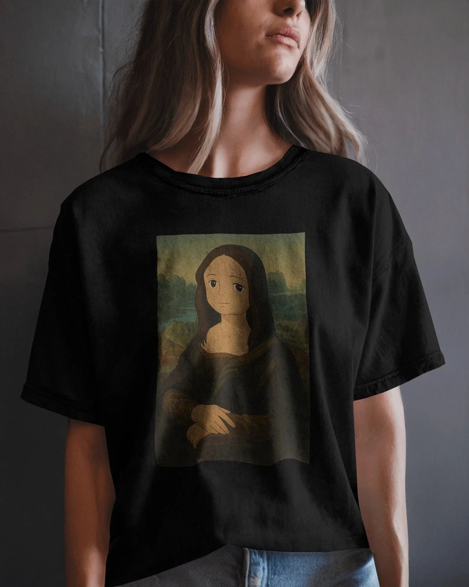 Black oversized t-shirt featuring a creative fusion of Ghibli art and the iconic Mona Lisa. The design reimagines the classic portrait in a whimsical anime-inspired style, printed on premium cotton for superior comfort and durability.