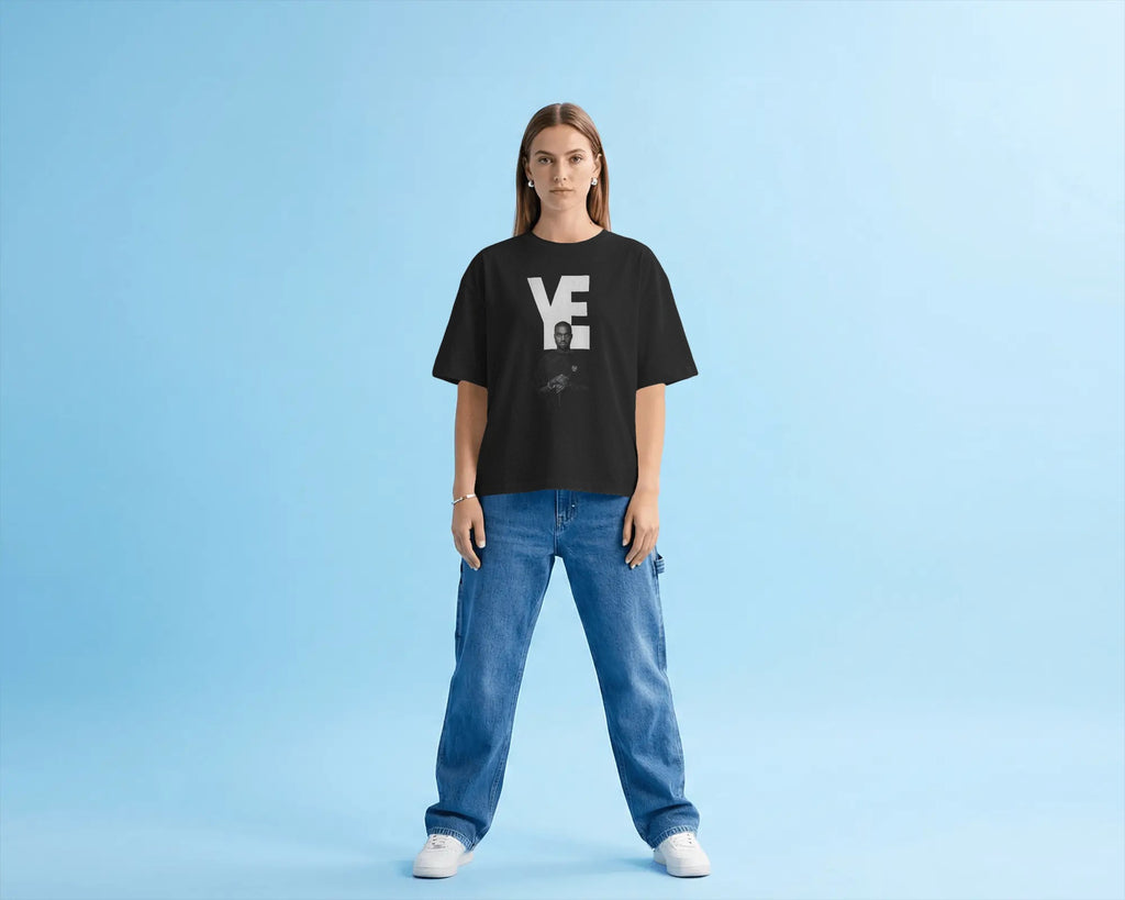 Kanye West YE inspired oversized black t-shirt from Nitorious Atelier with bold typography and portrait graphic in premium cotton