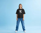 Kanye West YE inspired oversized black t-shirt from Nitorious Atelier with bold typography and portrait graphic in premium cotton. Kanye West Ye Live Concert Tour 