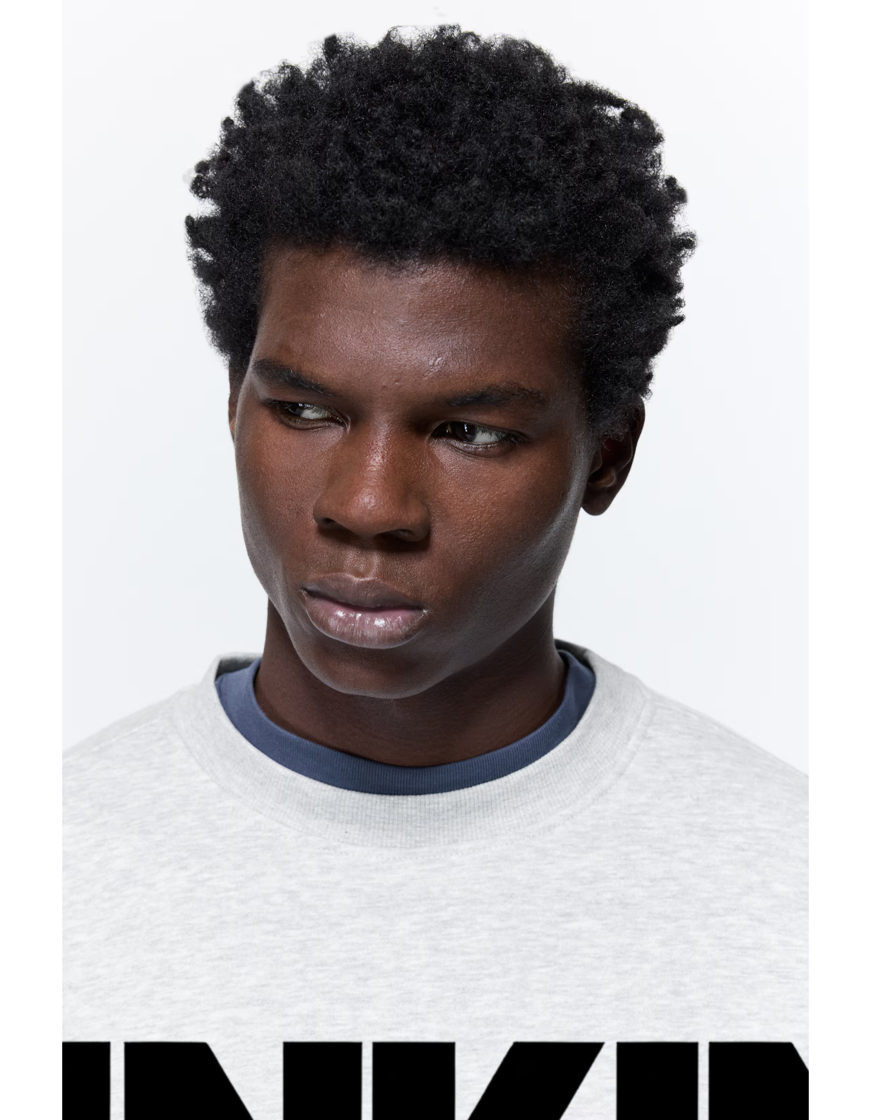 Linkin Park Logo Oversized Grey Marl Sweatshirt with bold black LP logo worn by male model.