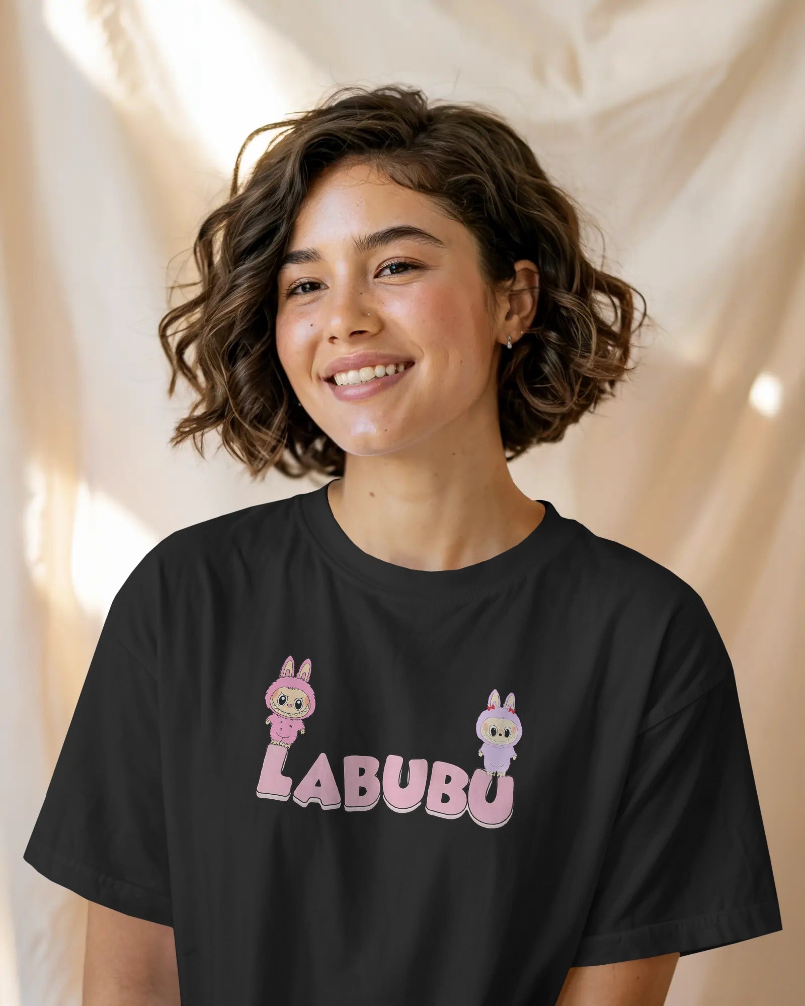 Labubu printed t-shirt featuring a vibrant and playful graphic of the popular character. Made from premium cotton for a soft, durable, and comfortable fit—perfect for casual streetwear lovers