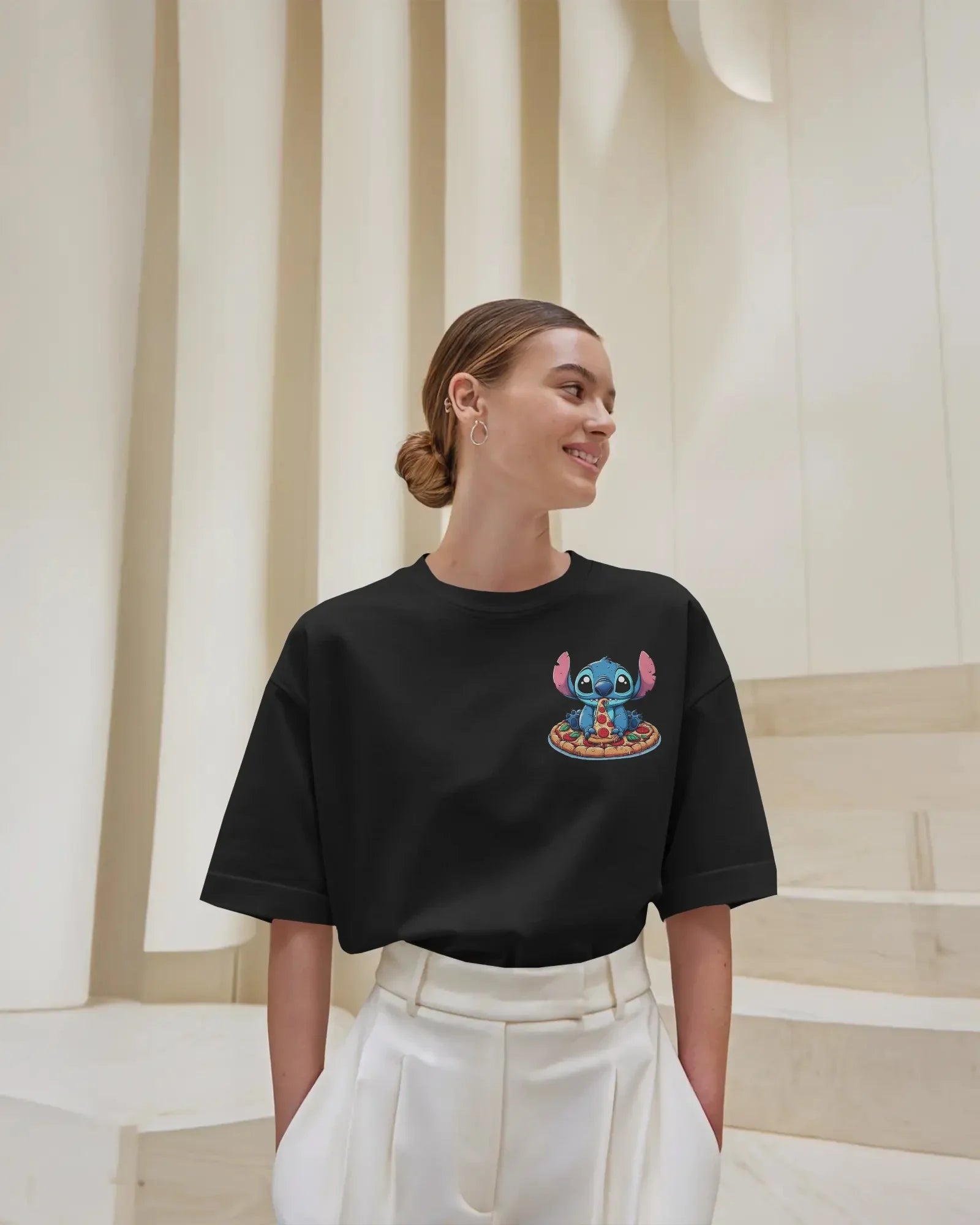 Black oversized t-shirt from Nitorious Atelier featuring a bold and edgy ‘Lio and Stiches’ graphic print. Made from premium cotton, offering a soft, breathable, and durable fit perfect for streetwear lovers.
