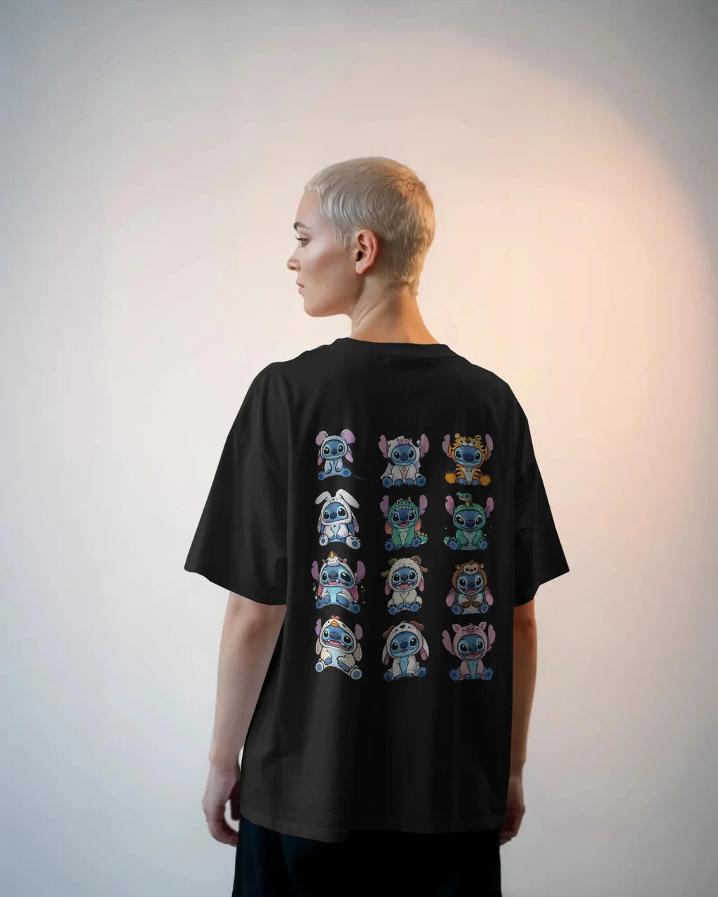 Black oversized t-shirt from Nitorious Atelier featuring a bold and edgy ‘Lio and Stiches’ graphic print. Made from premium cotton, offering a soft, breathable, and durable fit perfect for streetwear lovers.