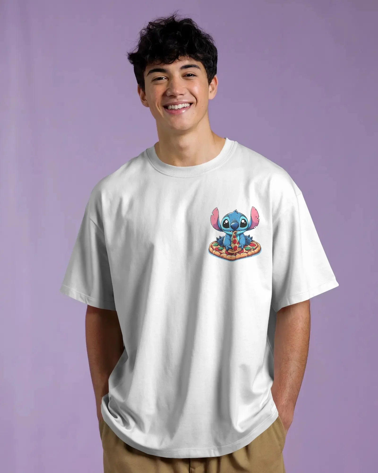 White oversized t-shirt from Nitorious Atelier featuring a striking ‘Lio and Stiches’ graphic print. Crafted from 220 GSM premium cotton for a soft, breathable, and durable streetwear look