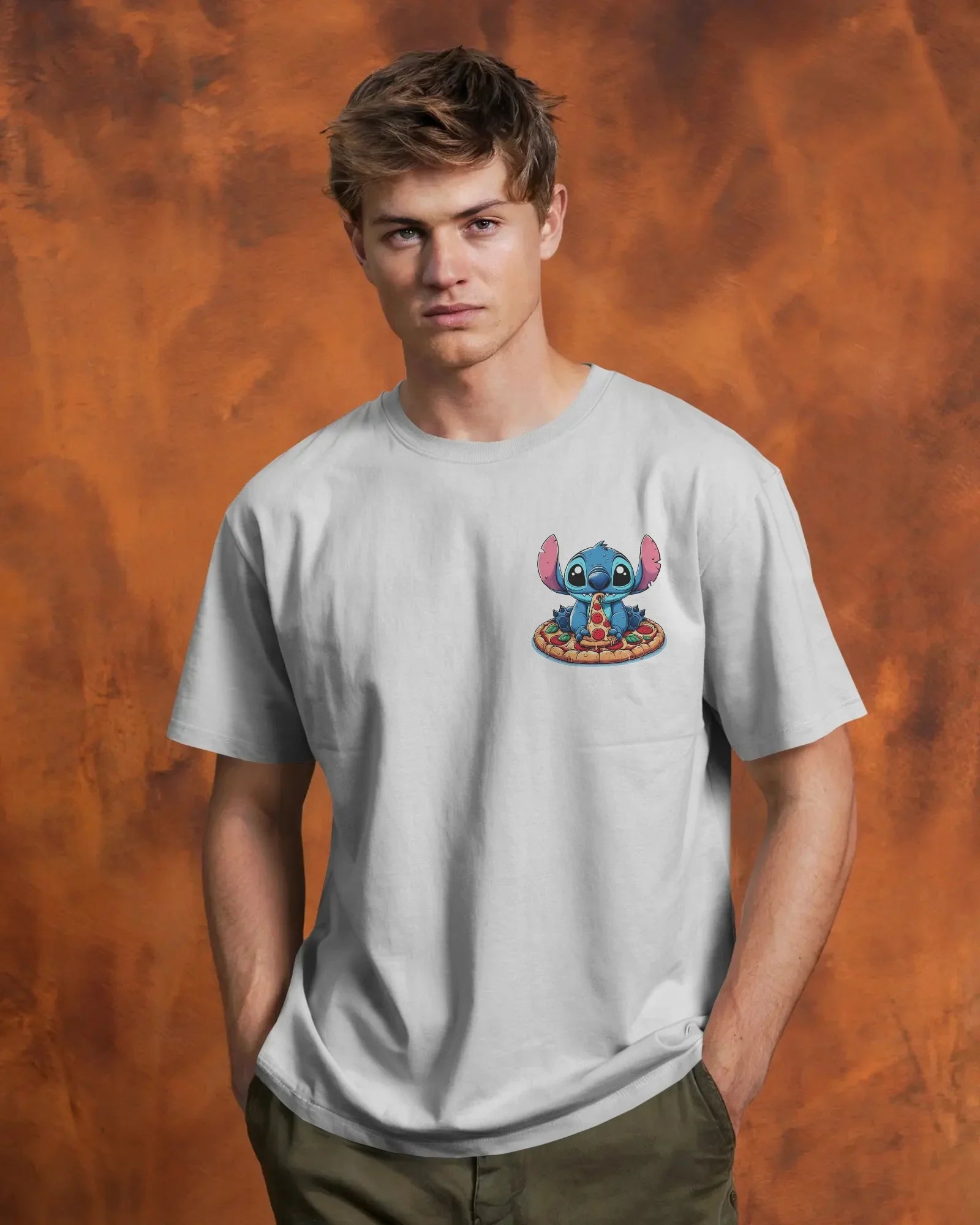 White oversized t-shirt from Nitorious Atelier featuring a striking ‘Lio and Stiches’ graphic print. Crafted from 220 GSM premium cotton for a soft, breathable, and durable streetwear look
