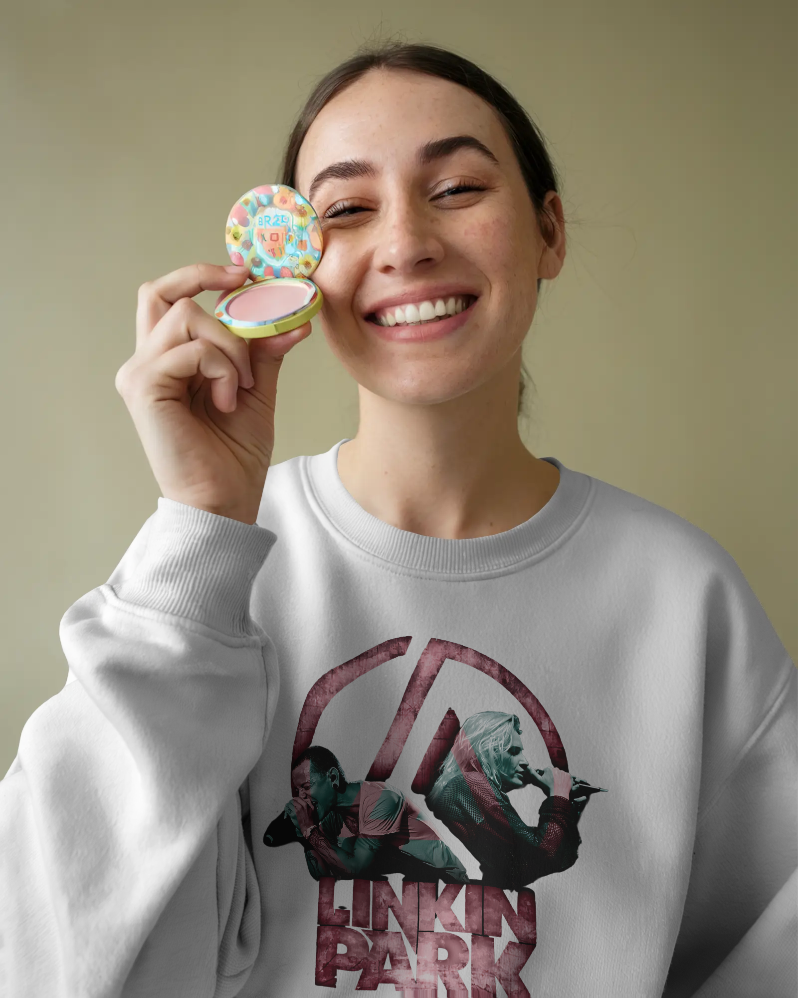 Model wearing Nitorious Atelier Linkin Park From Zero White Luxe Sweatshirt with bold graphic print on front.