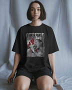 Linkin Park Chester Legacy Oversized Black T-Shirt from Nitorious Atelier with monochrome portrait and red graphic accents worn by  model