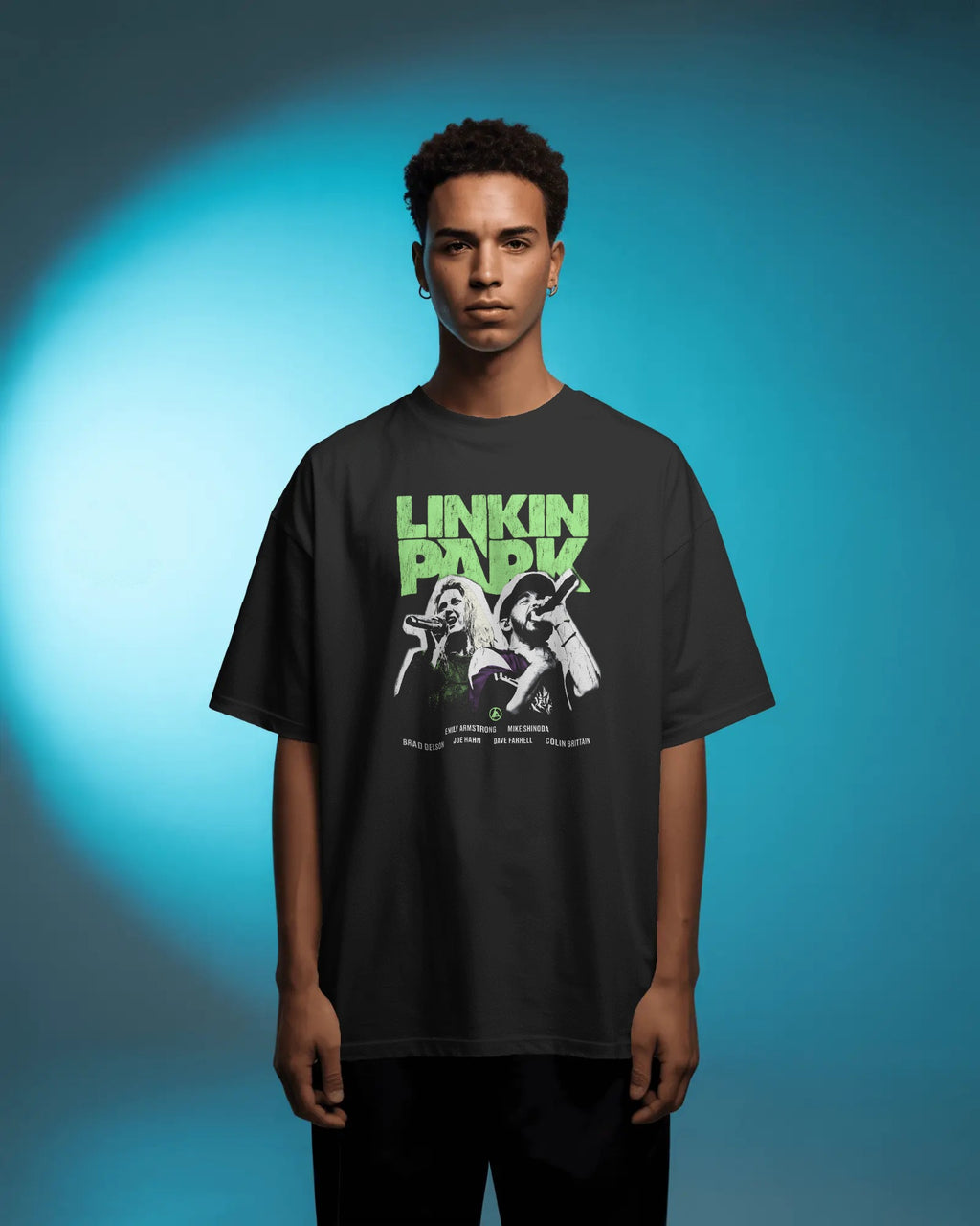 Linkin Park Neon Duo Oversized Black T-Shirt with neon green logo and duo portrait graphic worn by male model.