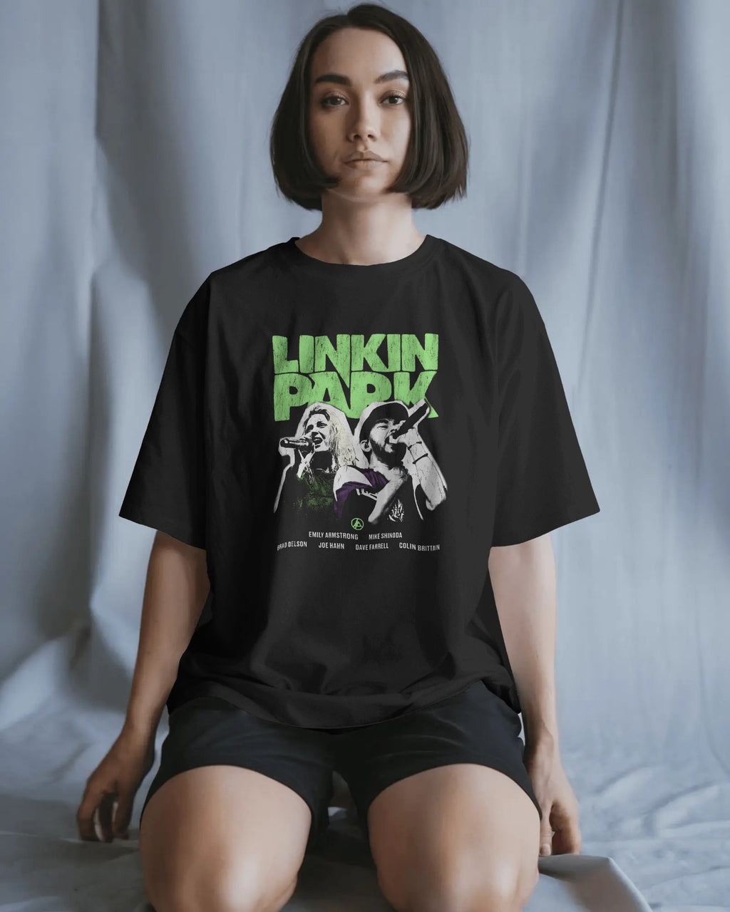 Linkin Park Neon Duo Oversized Black T-Shirt with neon green logo and duo portrait graphic worn by male model.