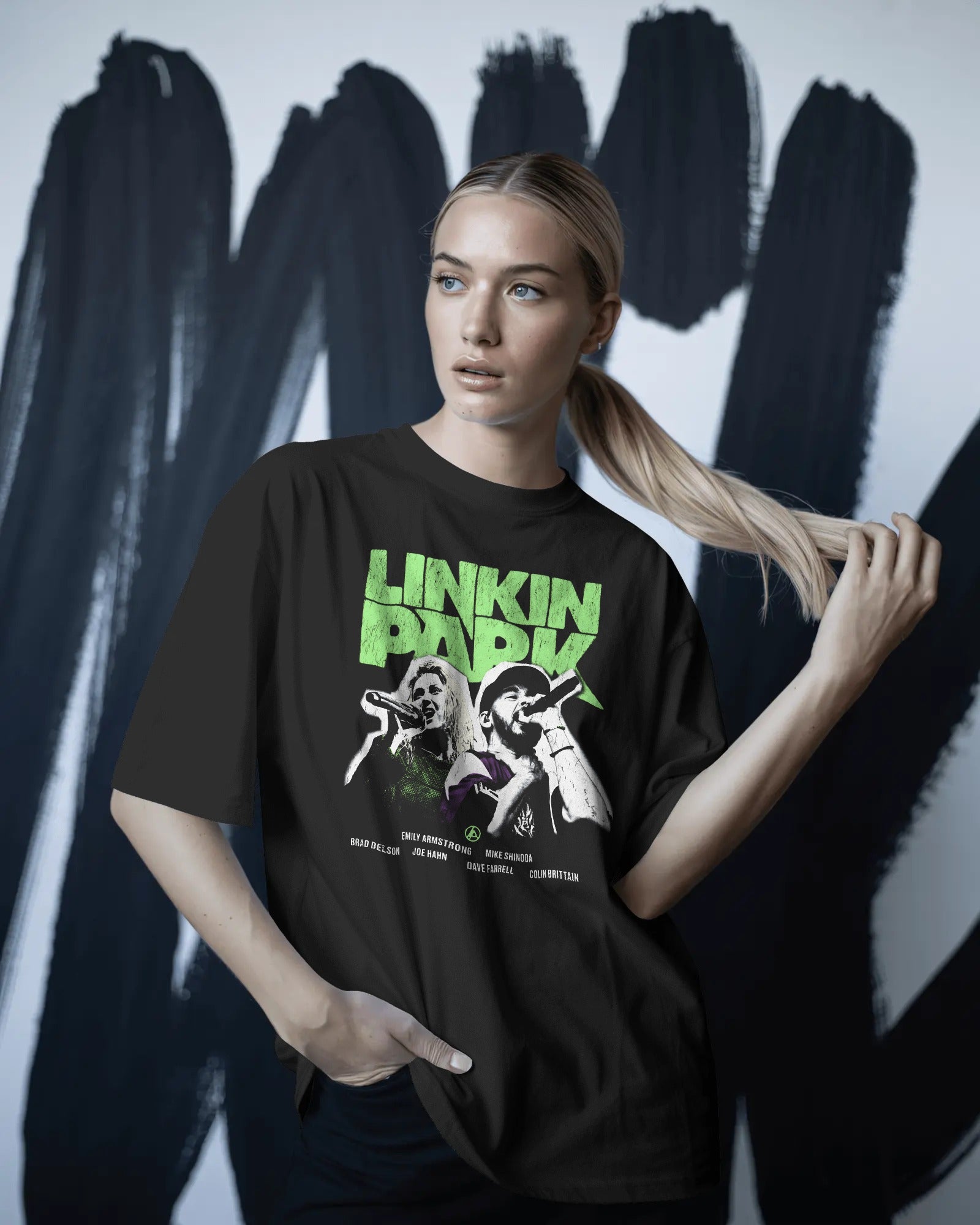 Linkin Park Neon Duo Oversized Black T-Shirt with neon green logo and duo portrait graphic worn by male model.