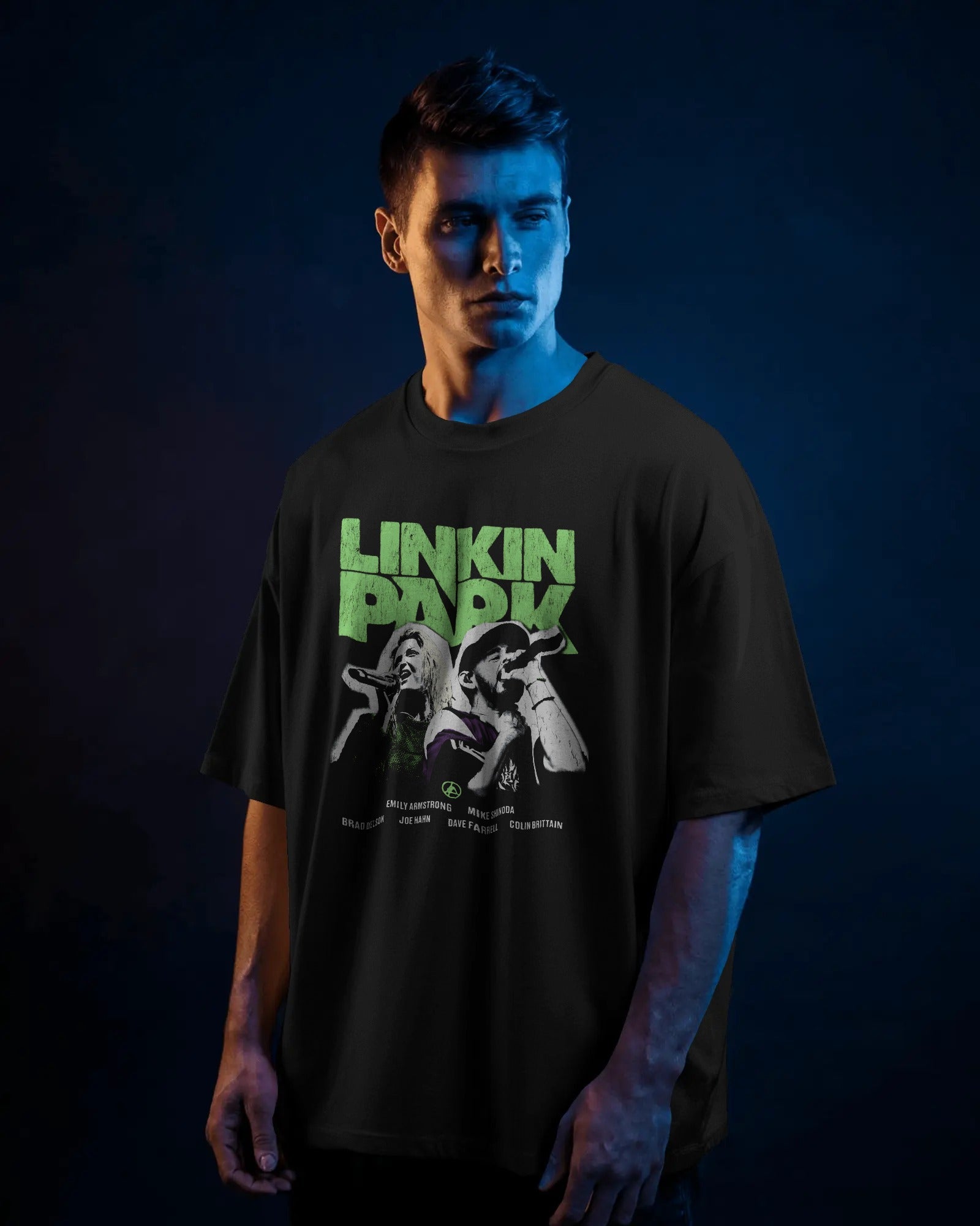 Linkin Park Neon Duo Oversized Black T-Shirt with neon green logo and duo portrait graphic worn by male model.