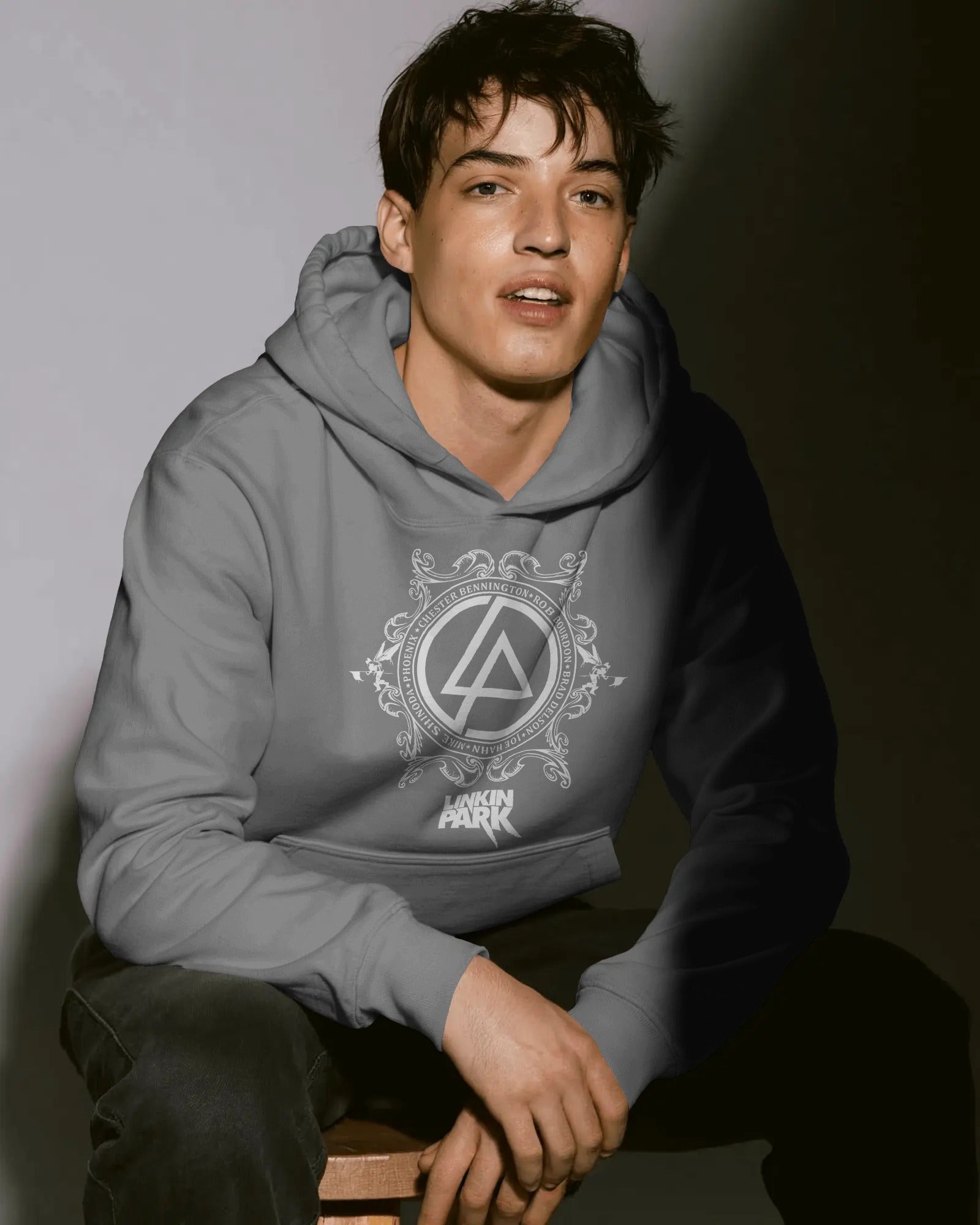Close-up of Linkin Park crest print on grey hoodie