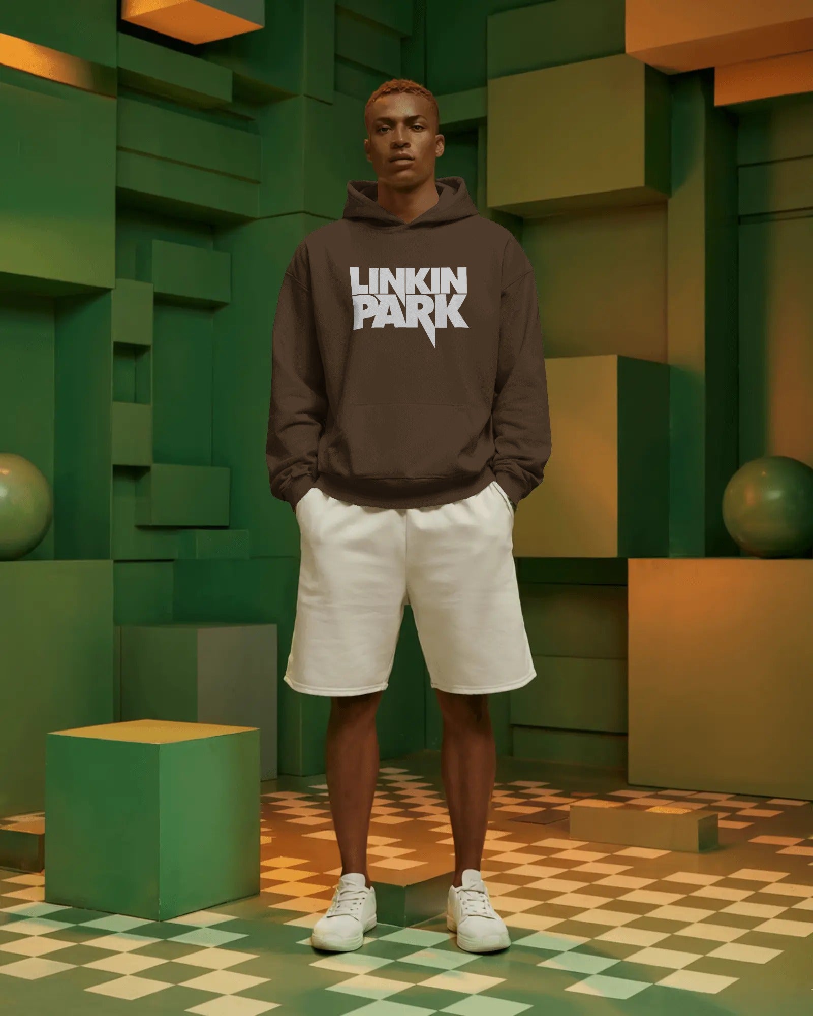 Close-up of white Linkin Park logo print on brown hoodie