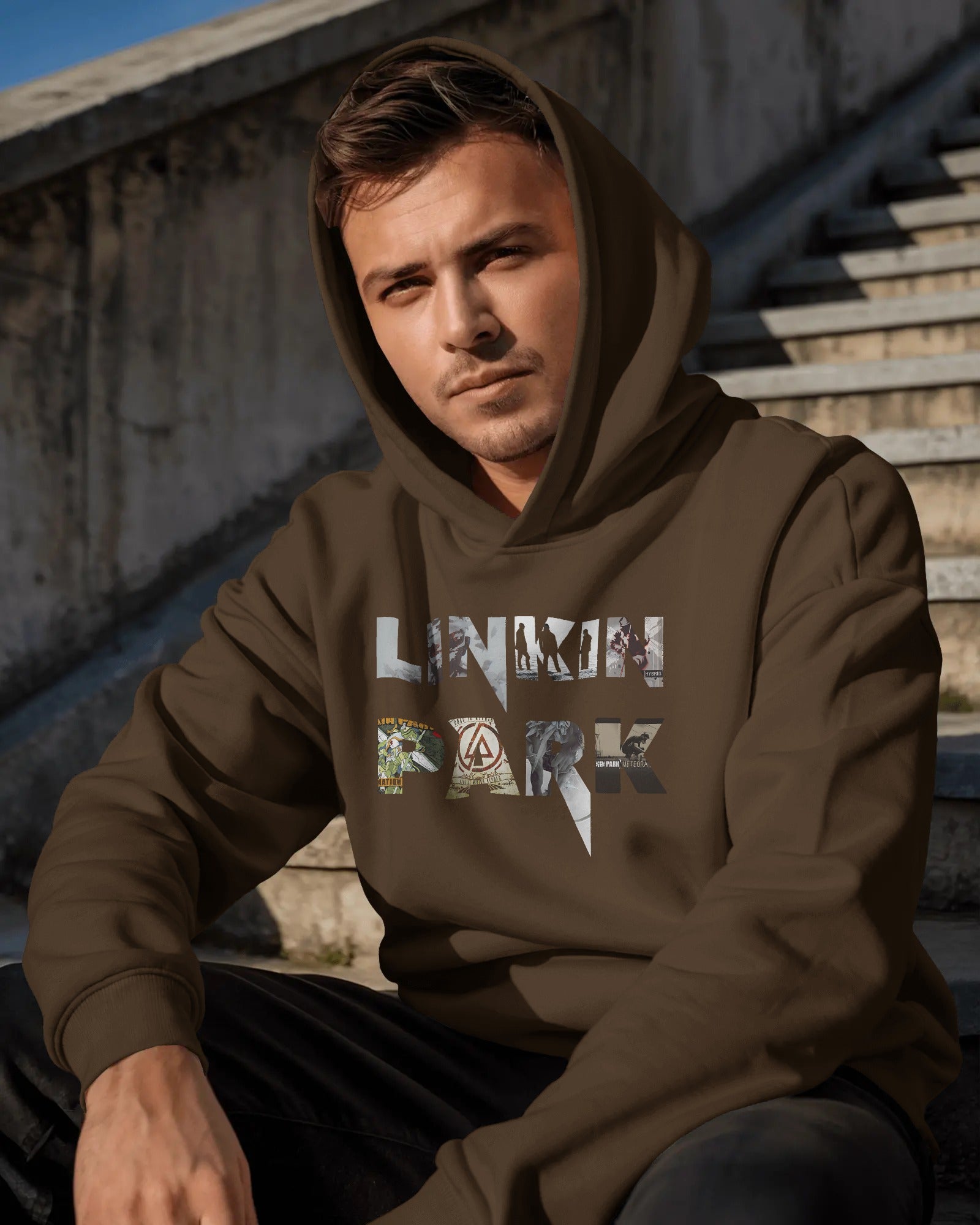 Linkin Park Legacy Brown Hoodie with collage band print hanging on clothing rack