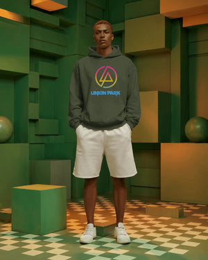 Close-up of neon gradient Linkin Park logo on olive hoodie