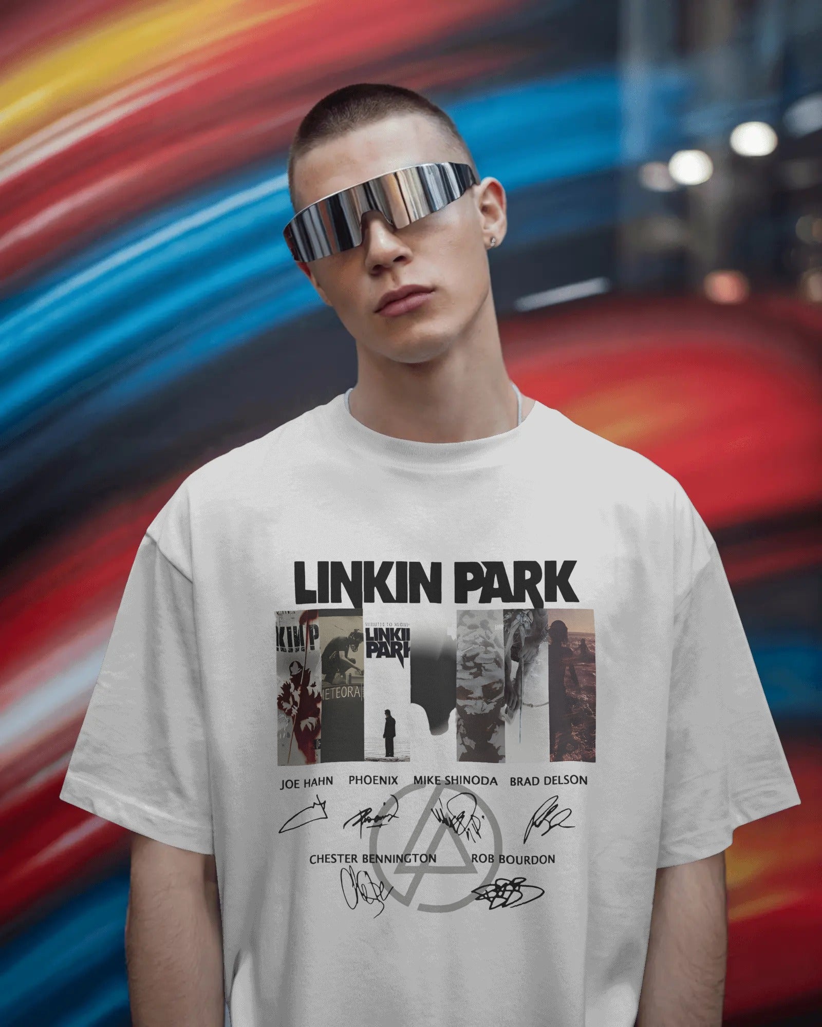 Linkin Park Signature Legacy Oversized White T-Shirt with album art collage and band signatures worn by model with futuristic sunglasses