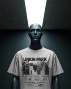 Linkin Park Signature Legacy Oversized White T-Shirt with album art collage and band signatures worn by model with futuristic sunglasses