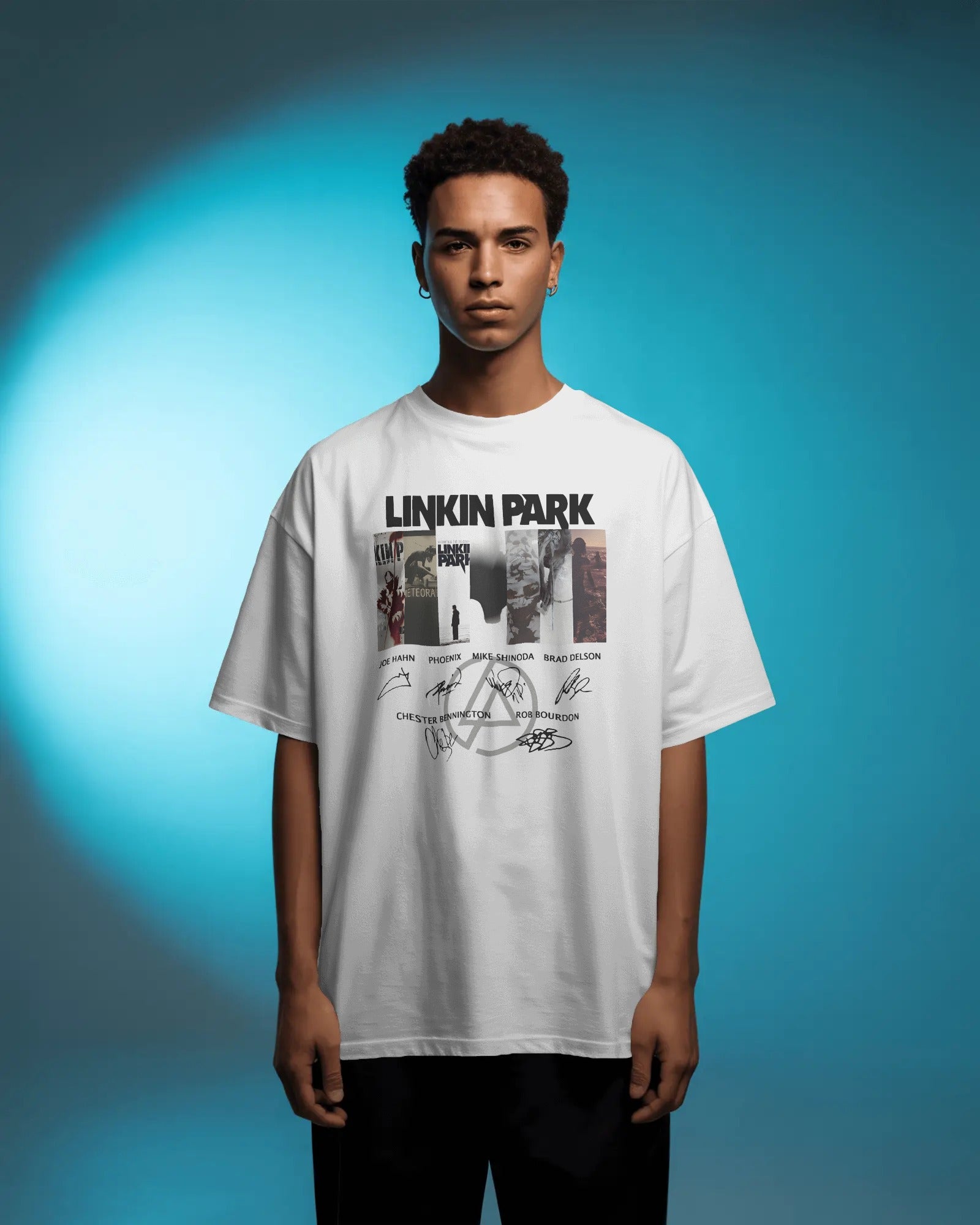 Linkin Park Signature Legacy Oversized White T-Shirt with album art collage and band signatures worn by model with futuristic sunglasses