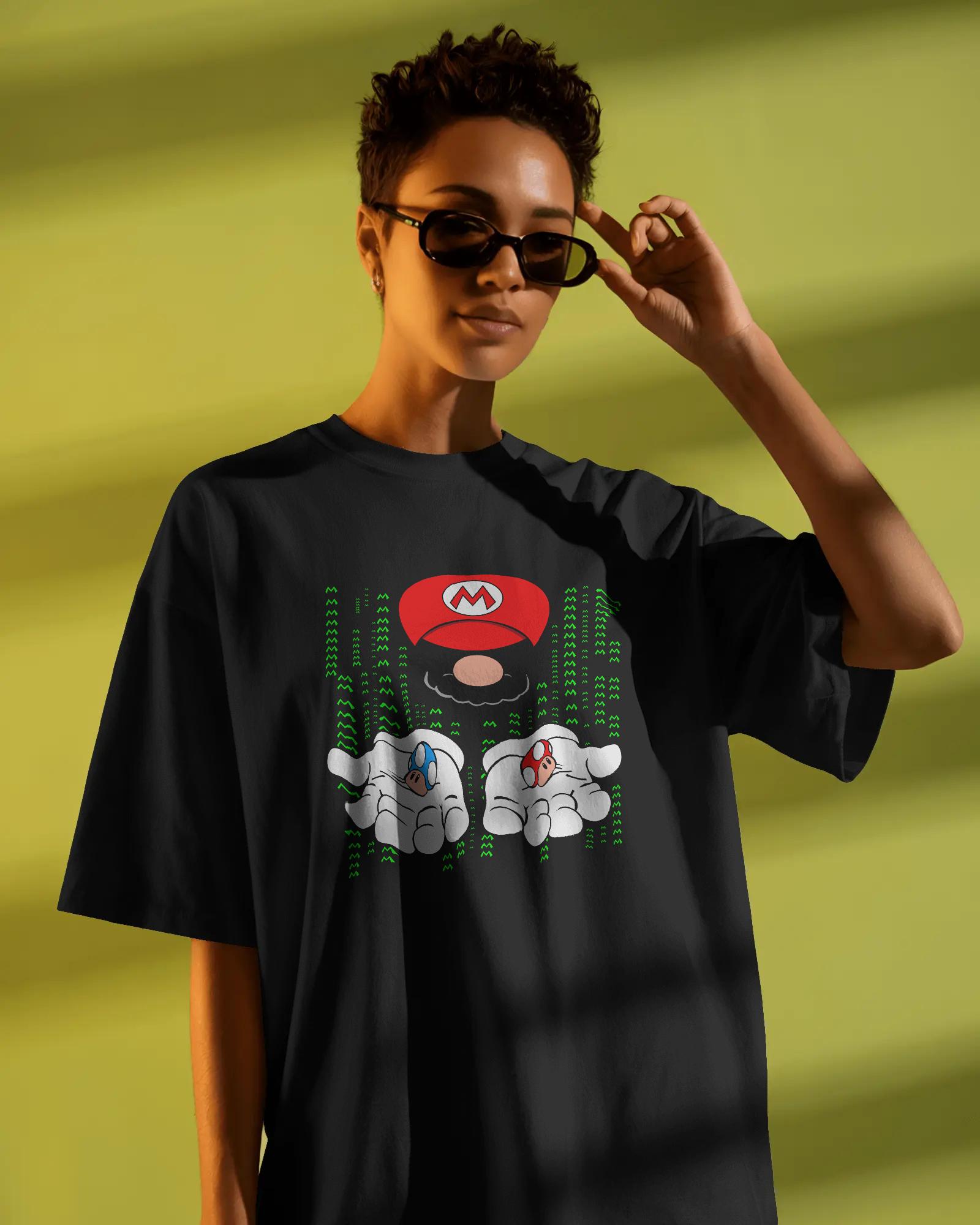 Black oversized t-shirt featuring a bold Mario print. Made from premium cotton, this t-shirt offers a relaxed fit, soft feel, and vibrant graphic for fans of classic gaming