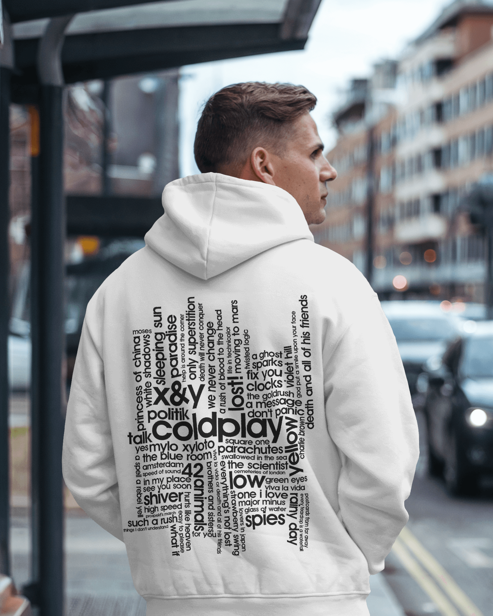 White hoodie featuring a vibrant Coldplay-inspired print from Nitorious Atelier. Made from 100% premium cotton fleece, this hoodie offers unmatched comfort, warmth, and a stylish look for music lovers.