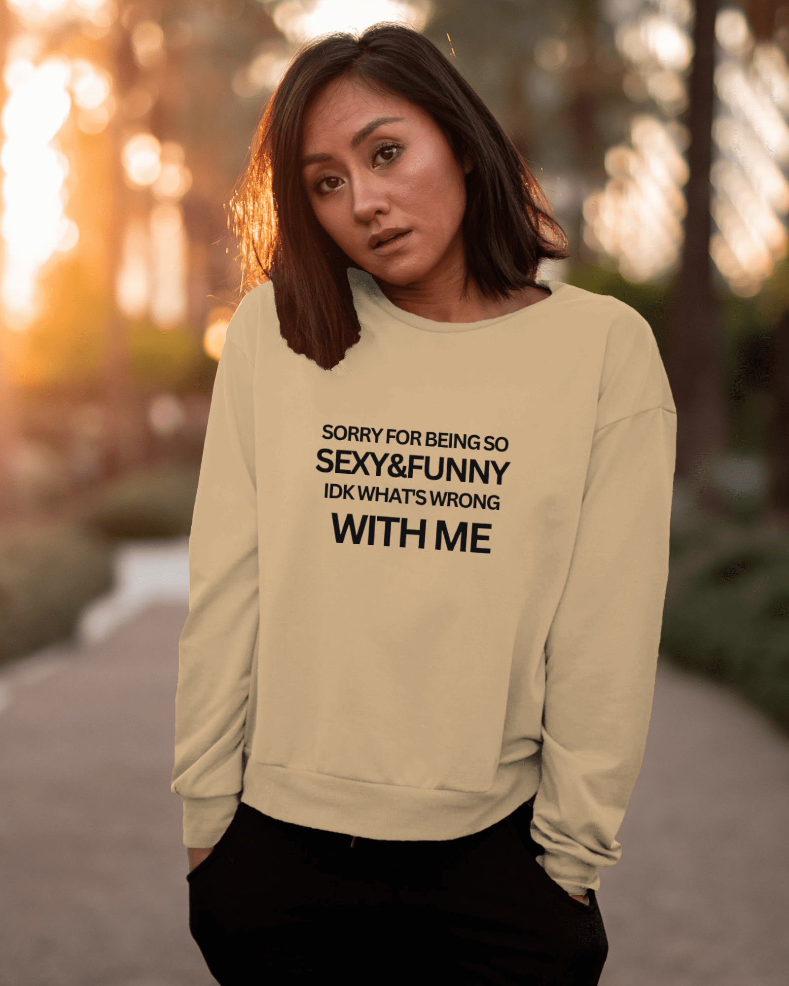 Beige sweatshirt from Nitorious Atelier featuring a playful and cheeky quote. Made from premium cotton fleece, this sweatshirt combines comfort and style for a fun, confident look.