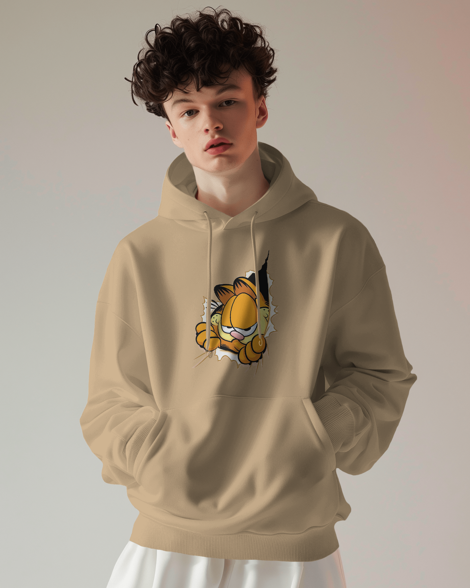 Garfield beige hoodie from Nitorious Atelier, featuring a relaxed fit and soft, premium cotton fleece for ultimate comfort. This stylish hoodie showcases a minimalist Garfield graphic in subtle tones, perfect for casual and cosy wear.