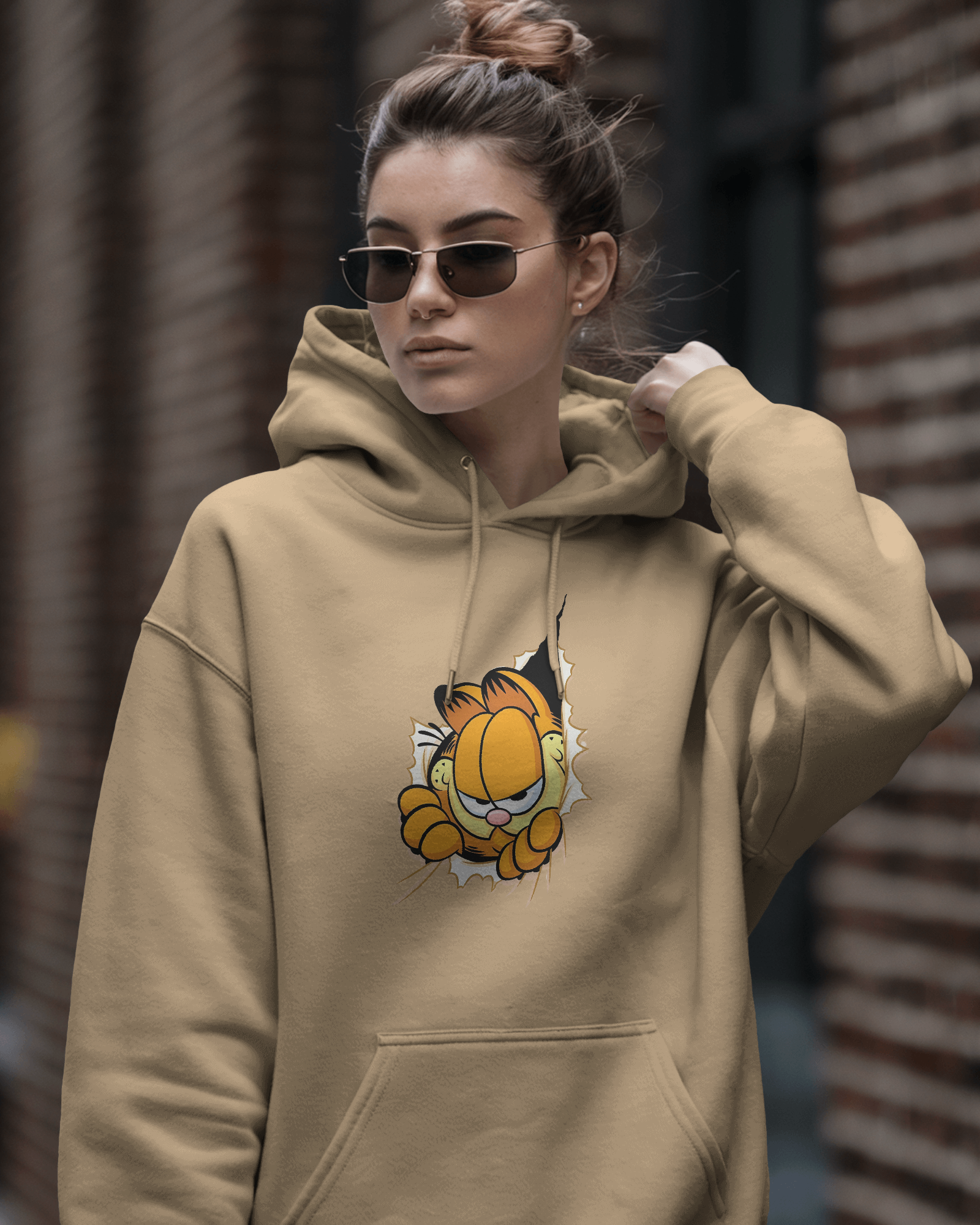 Garfield beige hoodie from Nitorious Atelier, featuring a relaxed fit and soft, premium cotton fleece for ultimate comfort. This stylish hoodie showcases a minimalist Garfield graphic in subtle tones, perfect for casual and cosy wear.