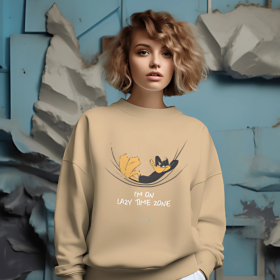 Beige Looney Tunes sweatshirt from Nitorious Atelier featuring a playful graphic of iconic characters. Made from premium cotton, this sweatshirt offers a cozy fit, perfect for casual wear with a touch of nostalgia.