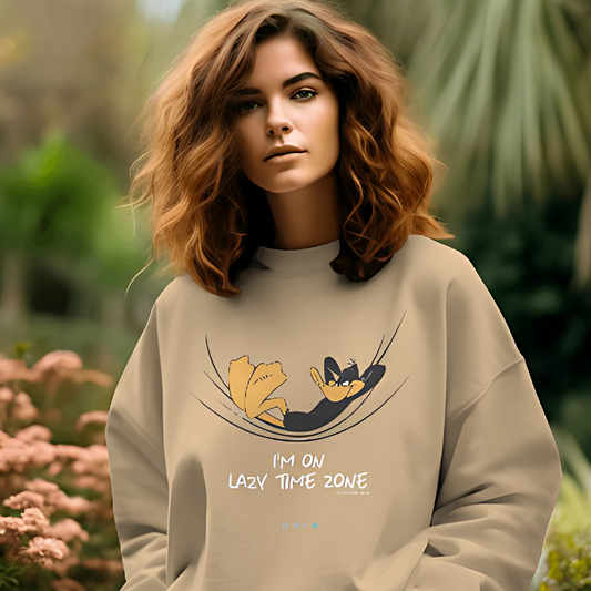 Beige Looney Tunes sweatshirt from Nitorious Atelier featuring a playful graphic of iconic characters. Made from premium cotton, this sweatshirt offers a cozy fit, perfect for casual wear with a touch of nostalgia.