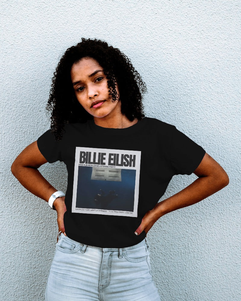 Black regular fit Billie Eilish t-shirt from Nitorious Atelier featuring a striking, vibrant graphic of Billie Eilish. Crafted from premium cotton, this t-shirt combines comfort and edgy style, ideal for fans and fashion-forward individuals looking to stand out.