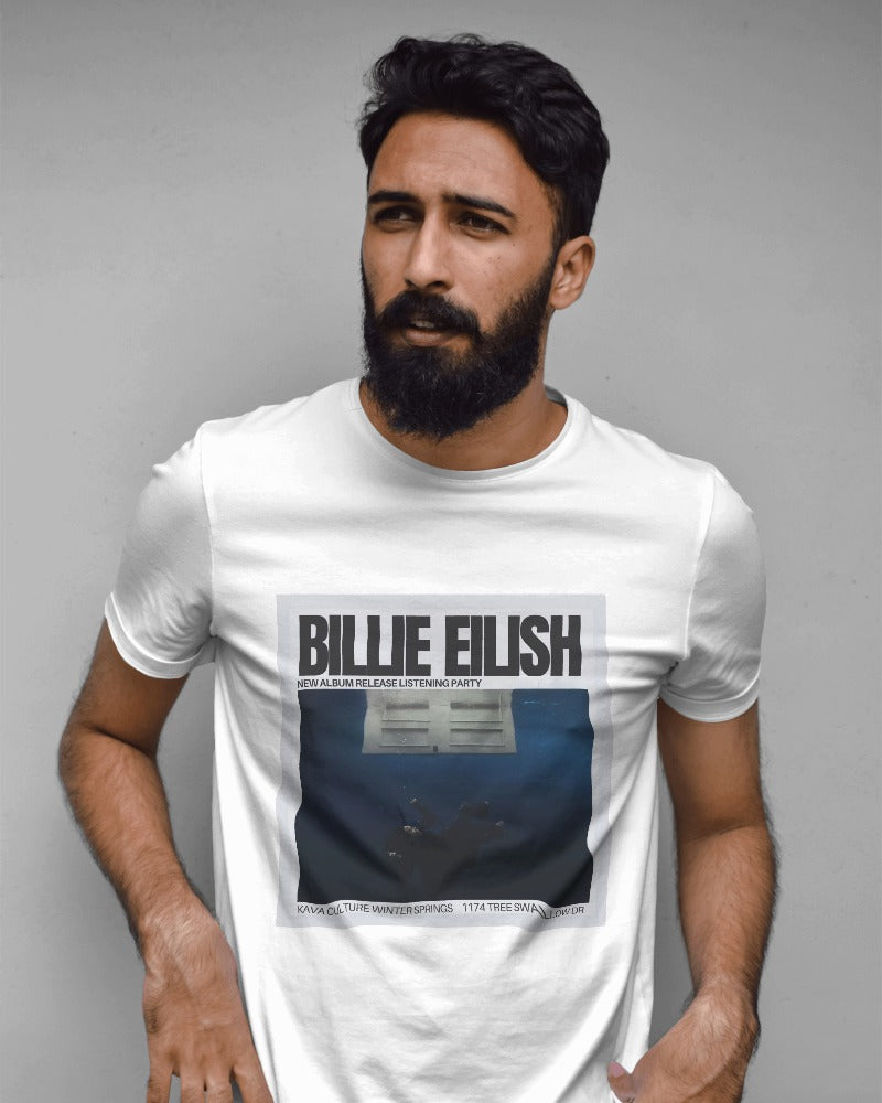 White regular fit Billie Eilish t-shirt from Nitorious Atelier featuring a bold, colorful graphic of Billie Eilish. Made from premium cotton, this t-shirt offers exceptional comfort and style. Perfect for fans and fashion enthusiasts looking to make a statement with a high-quality, trendy piece.